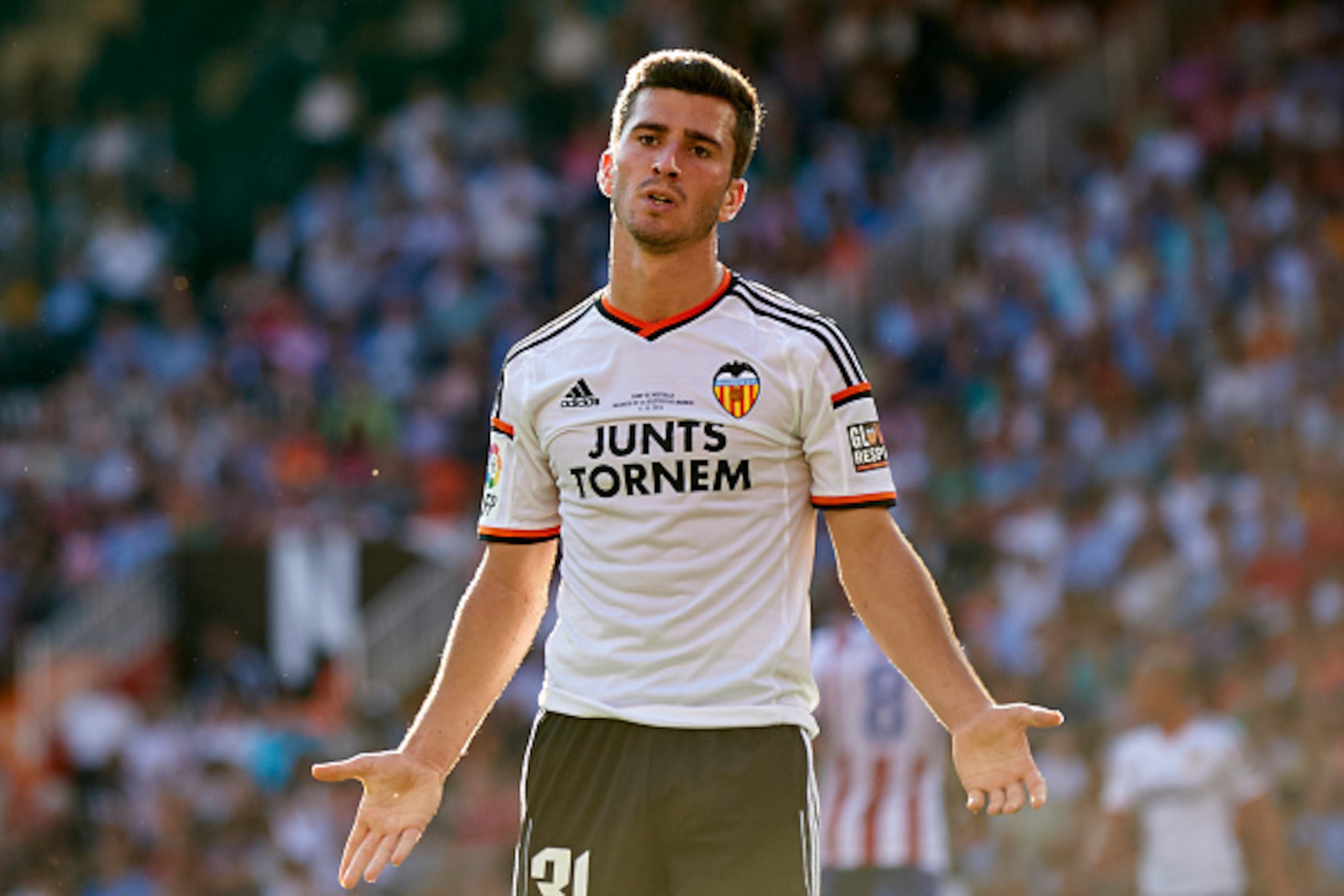 VALENCIA, SPAIN - OCTOBER 04:  Jose Gaya of Valencia reacts during the La Liga match between Valencia CF and Club Atletico de Madrid at Estadi de Mestalla on October 4, 2014 in Valencia, Spain.  (Photo by Manuel Queimadelos Alonso/Getty Images)