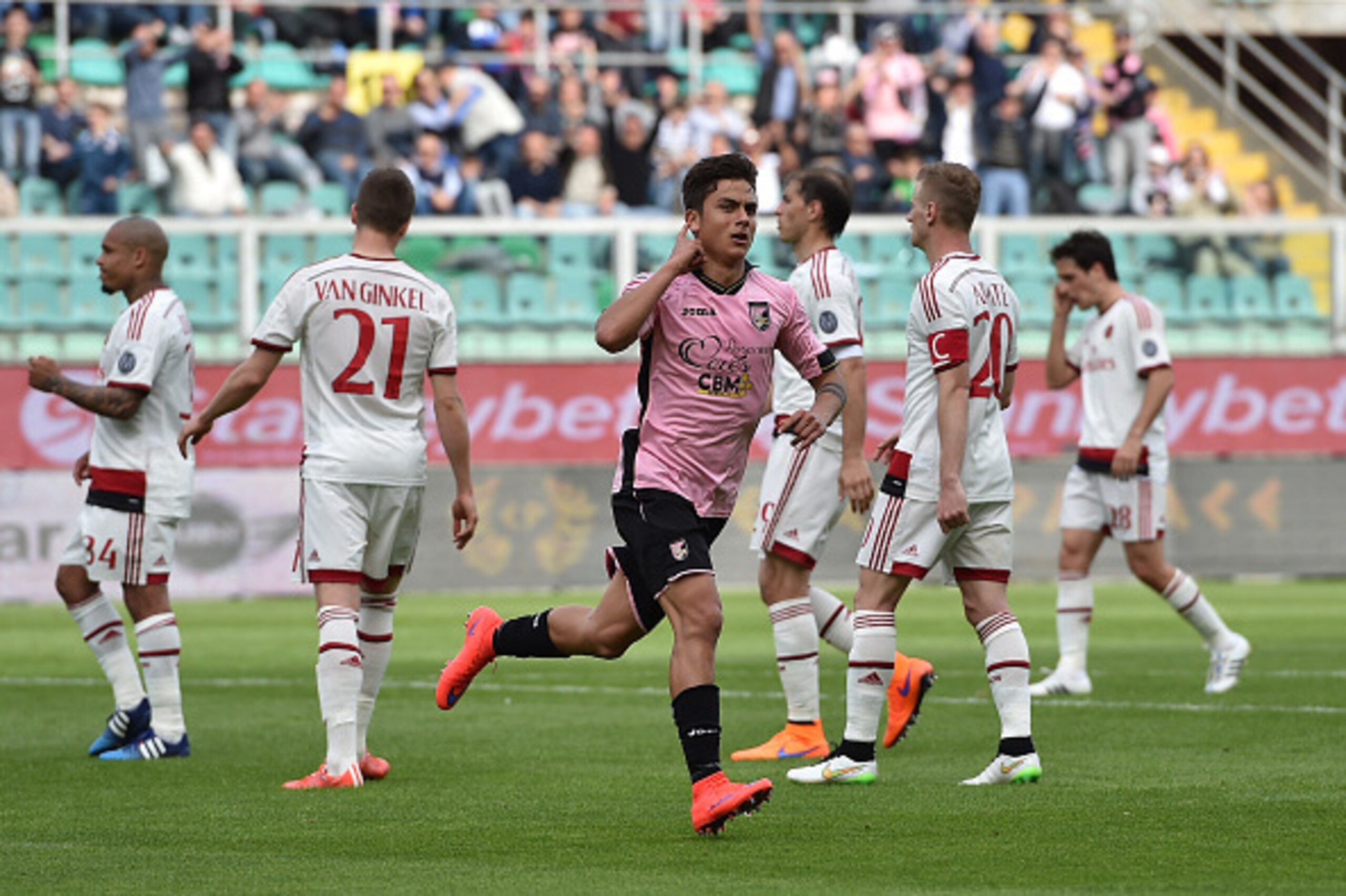 PALERMO, ITALY - APRIL 04: Paulo Dybala of Palermo celebrates after scoring a penalty (1-1) during the Serie A match between US Citta di Palermo and AC Milan at Stadio Renzo Barbera on April 4, 2015 in Palermo, Italy. (Photo by Tullio M. Puglia/Getty Im PALERMO, ITALY - APRIL 04: Paulo Dybala of Palermo celebrates after scoring a penalty (1-1) during the Serie A match between US Citta di Palermo and AC Milan at Stadio Renzo Barbera on April 4, 2015 in Palermo, Italy. (Photo by Tullio M. Puglia/Getty Im
