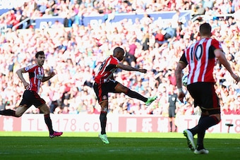 SUNDERLAND, ENGLAND - APRIL 05: Jermain Defoe of Sunderland scores the opening goal during the Barclays Premier League match between Sunderland and Newcastle United at Stadium of Light on April 5, 2015 in Sunderland, England.  (Photo by Matthew Lewis/Gett