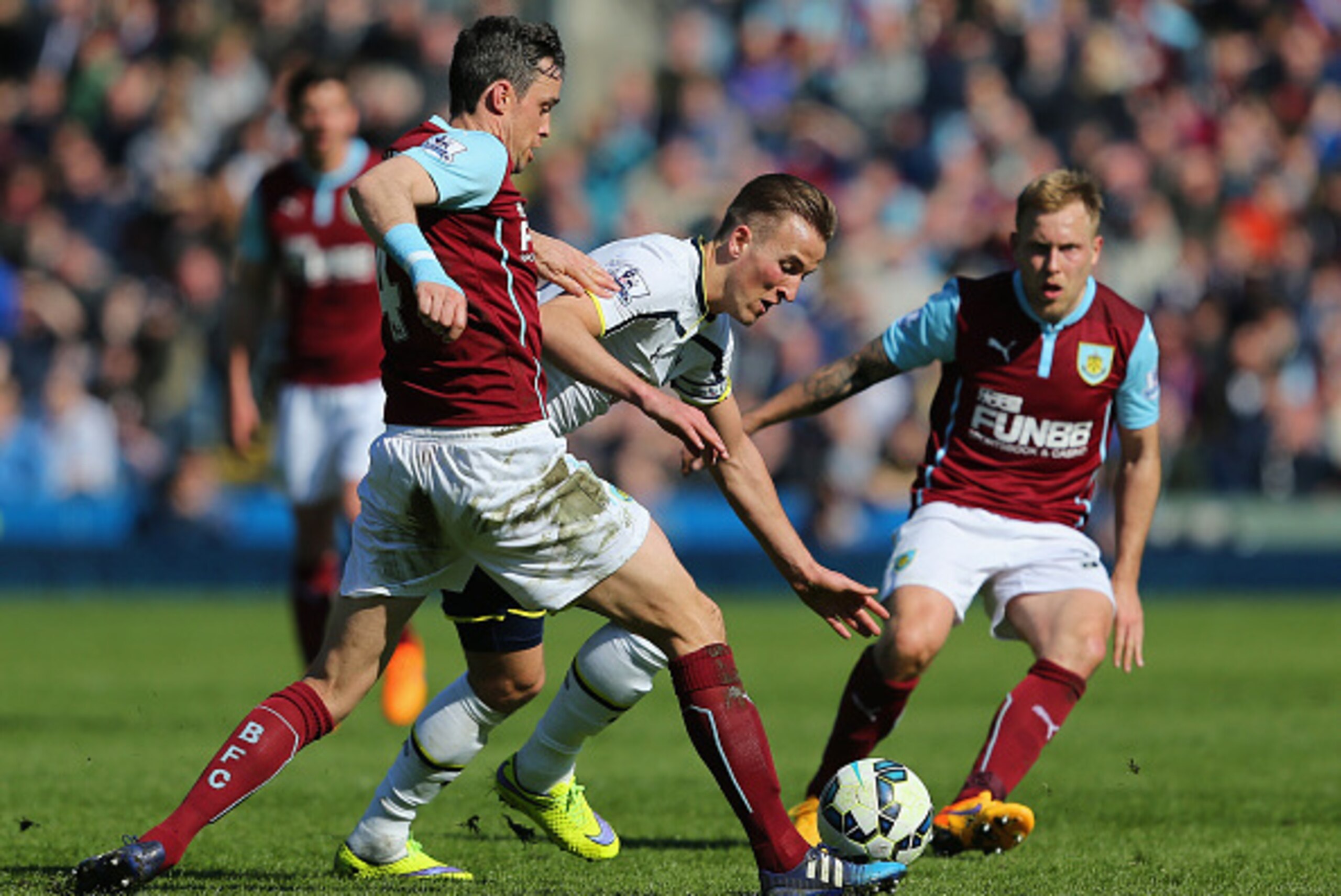 BURNLEY, ENGLAND - APRIL 05: Michael Duff of Burnley tackles Harry Kane of Spurs during the Barclays Premier League match between Burnley and Tottenham Hotspur at Turf Moor on April 5, 2015 in Burnley, England. (Photo by Jan Kruger/Getty Images) BURNLEY, ENGLAND - APRIL 05: Michael Duff of Burnley tackles Harry Kane of Spurs during the Barclays Premier League match between Burnley and Tottenham Hotspur at Turf Moor on April 5, 2015 in Burnley, England. (Photo by Jan Kruger/Getty Images)