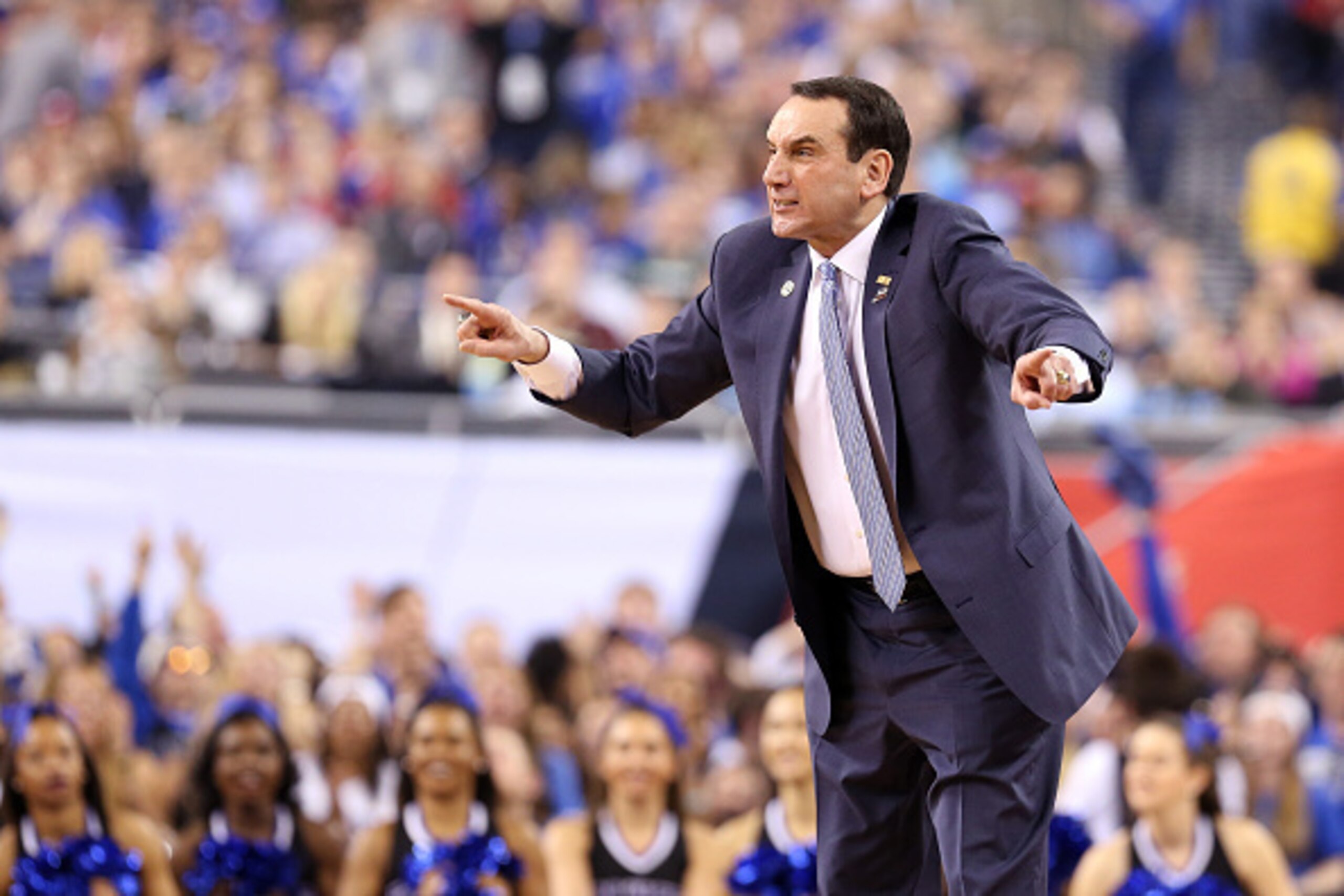 INDIANAPOLIS, IN - APRIL 04: Head coach Mike Krzyzewski of the Duke Blue Devils reacts on the sideline in the second half against the Michigan State Spartans during the NCAA Men's Final Four Semifinal at Lucas Oil Stadium on April 4, 2015 in Indianapolis,