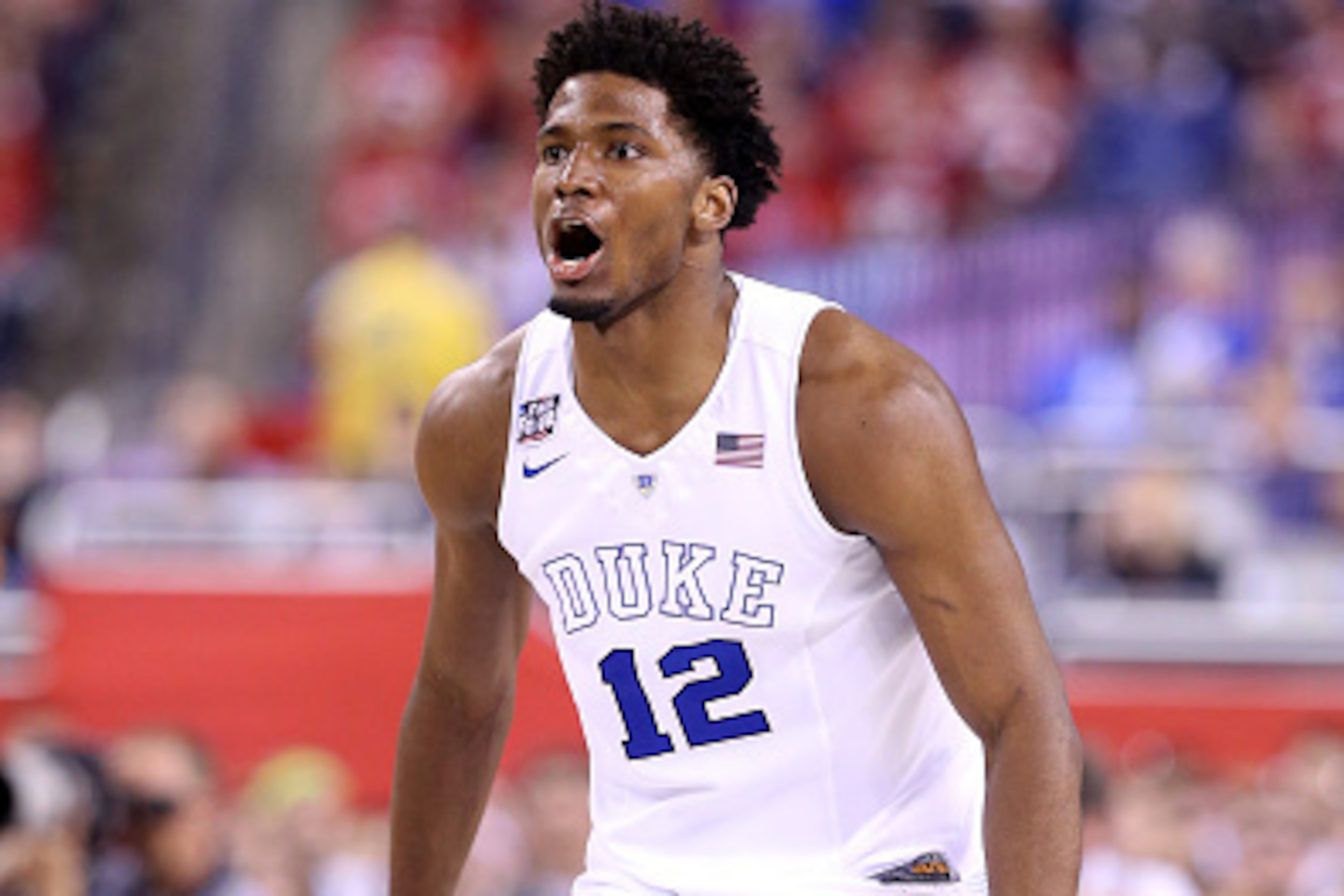 INDIANAPOLIS, IN - APRIL 04: Justise Winslow #12 of the Duke Blue Devils reacts after a play in the second half against the Michigan State Spartans during the NCAA Men's Final Four Semifinal at Lucas Oil Stadium on April 4, 2015 in Indianapolis, Indiana. 