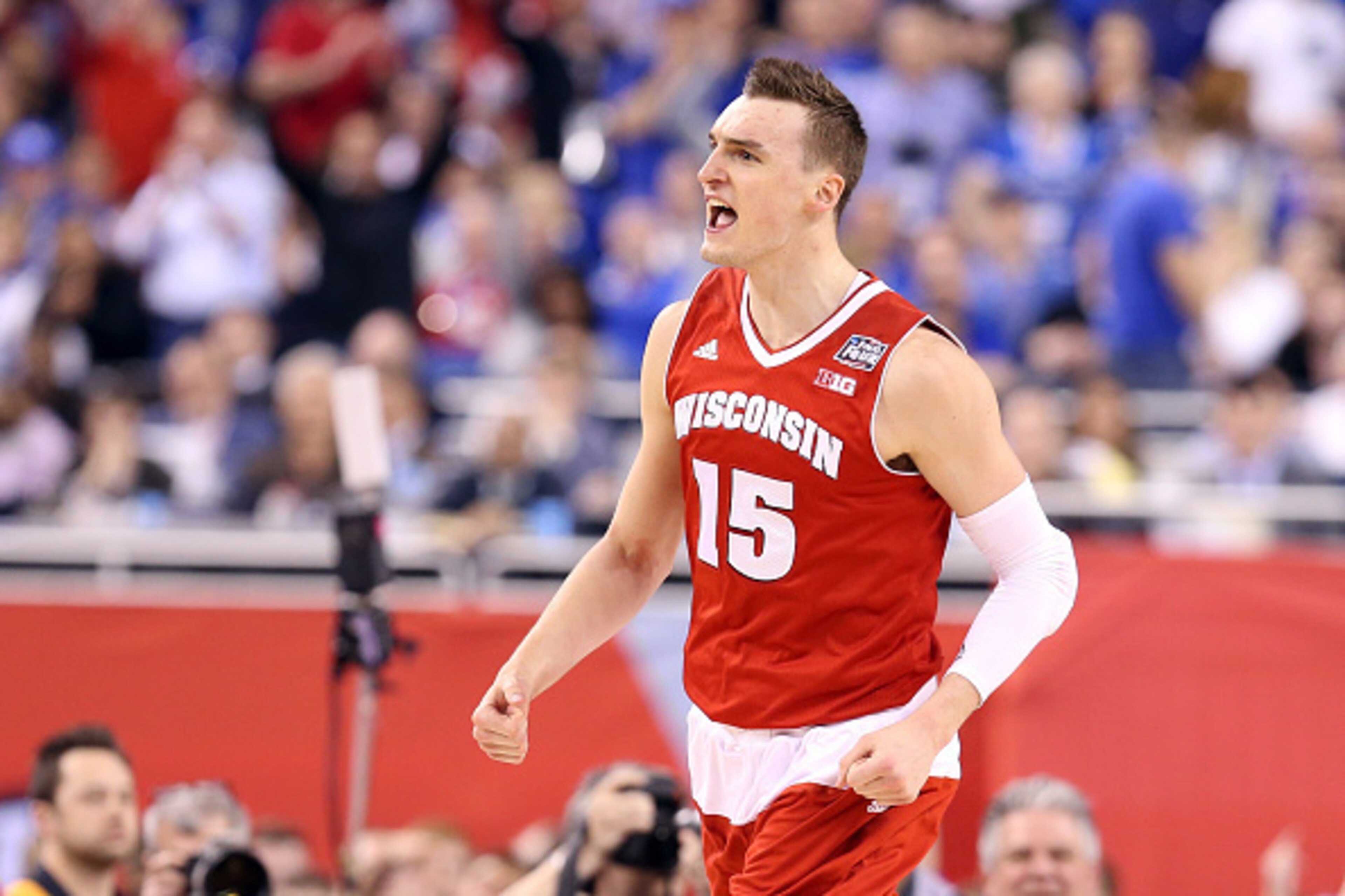 INDIANAPOLIS, IN - APRIL 04: Sam Dekker #15 of the Wisconsin Badgers reacts after a play late in the second half against the Kentucky Wildcats during the NCAA Men's Final Four Semifinal at Lucas Oil Stadium on April 4, 2015 in Indianapolis, Indiana.  (Pho