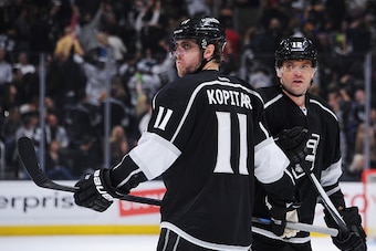 LOS ANGELES, CA - APRIL 02: Anze Kopitar #11 and Marian Gaborik #12 of the Los Angeles Kings look on during a game against the Edmonton Oilers at STAPLES Center on April 02, 2015 in Los Angeles, California. (Photo by Juan Ocampo/NHLI via Getty Images)