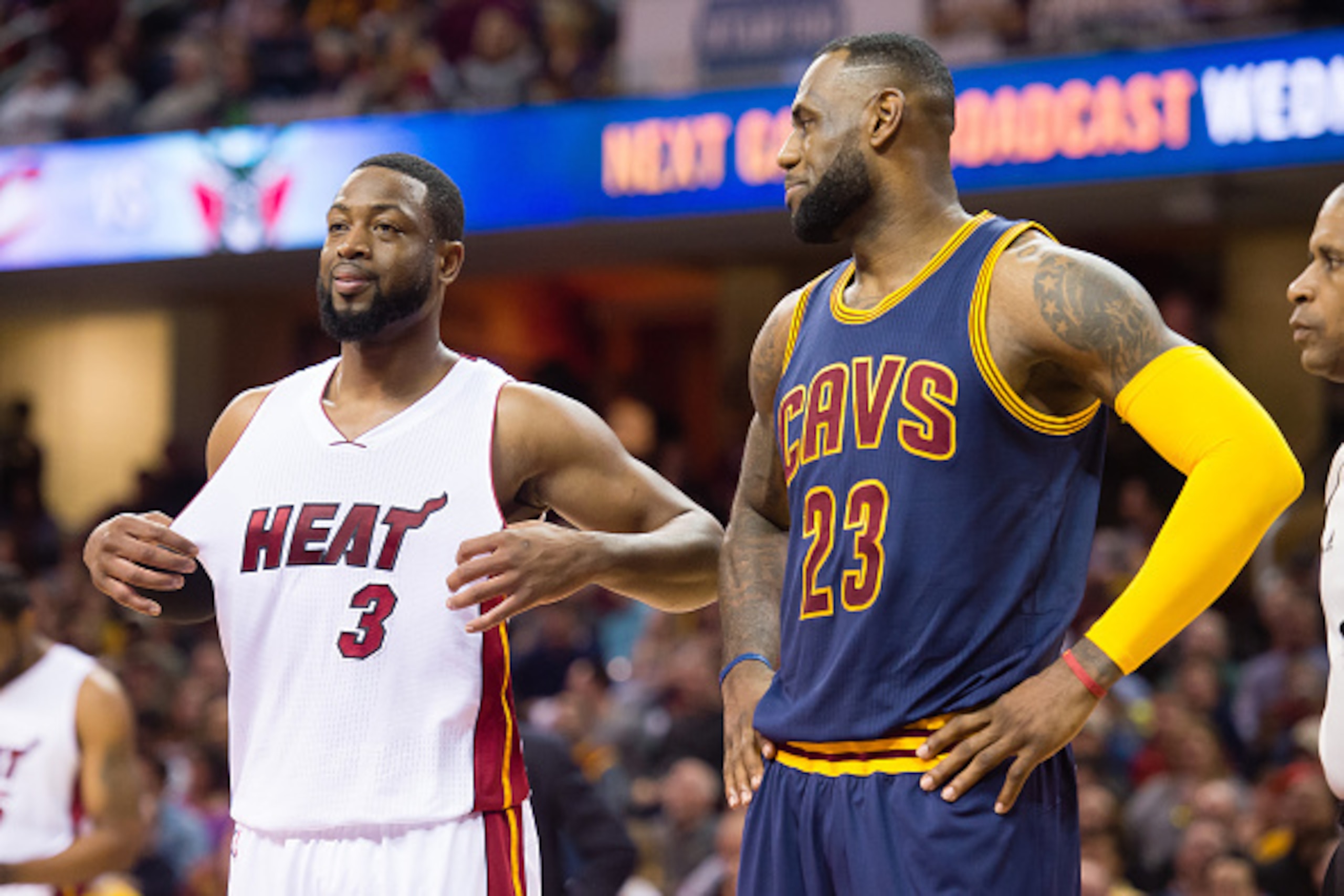 CLEVELAND, OH - APRIL 2:  Dwyane Wade #3 of the Miami Heat talks with LeBron James #23 of the Cleveland Cavaliers during the first half at Quicken Loans Arena on April 2, 2015 in Cleveland, Ohio. NOTE TO USER: User expressly acknowledges and agrees that, 