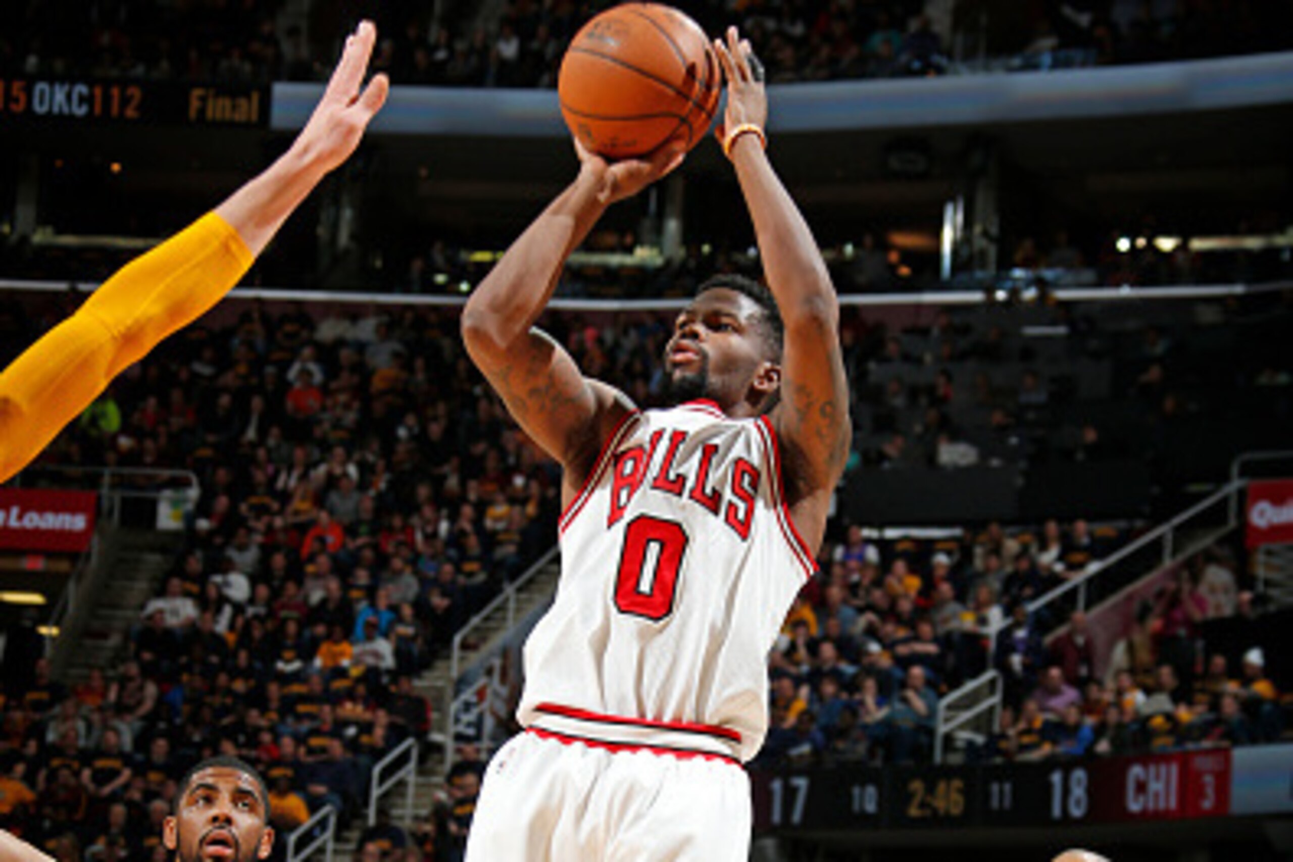 CLEVELAND, OH - APRIL 5:  Aaron Brooks #0 of the Chicago Bulls shoots the ball against the Cleveland Cavaliers on April 5, 2015 at Quicken Loans Arena in Cleveland, Ohio. NOTE TO USER: User expressly acknowledges and agrees that, by downloading and/or usi