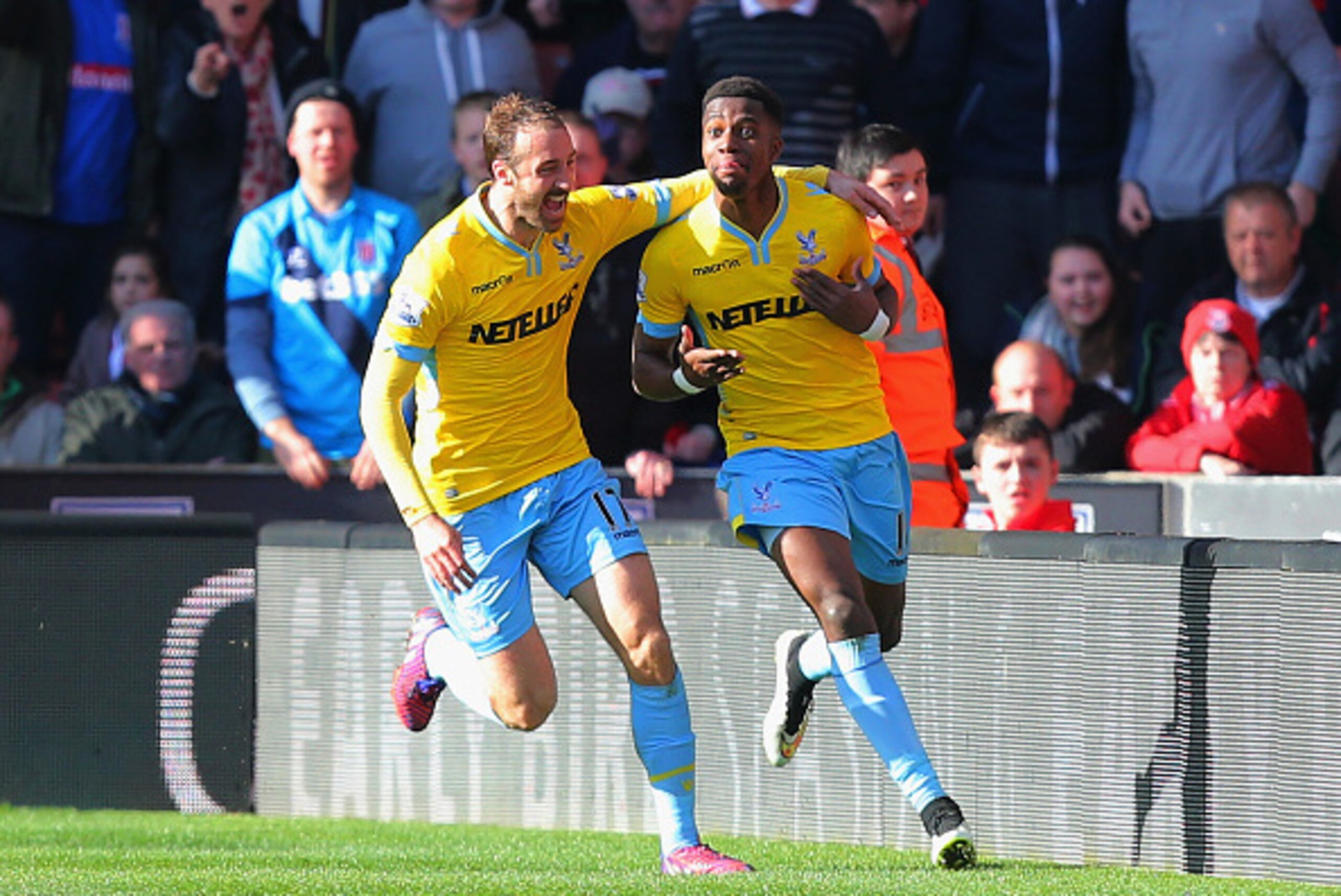 STOKE ON TRENT, ENGLAND - MARCH 21: Wilfried Zaha of Crystal Palace (R) celebrates scoring their second goal with Glenn Murray of Crystal Palace during the Barclays Premier League match between Stoke City and Crystal Palace at Britannia Stadium on March STOKE ON TRENT, ENGLAND - MARCH 21: Wilfried Zaha of Crystal Palace (R) celebrates scoring their second goal with Glenn Murray of Crystal Palace during the Barclays Premier League match between Stoke City and Crystal Palace at Britannia Stadium on March