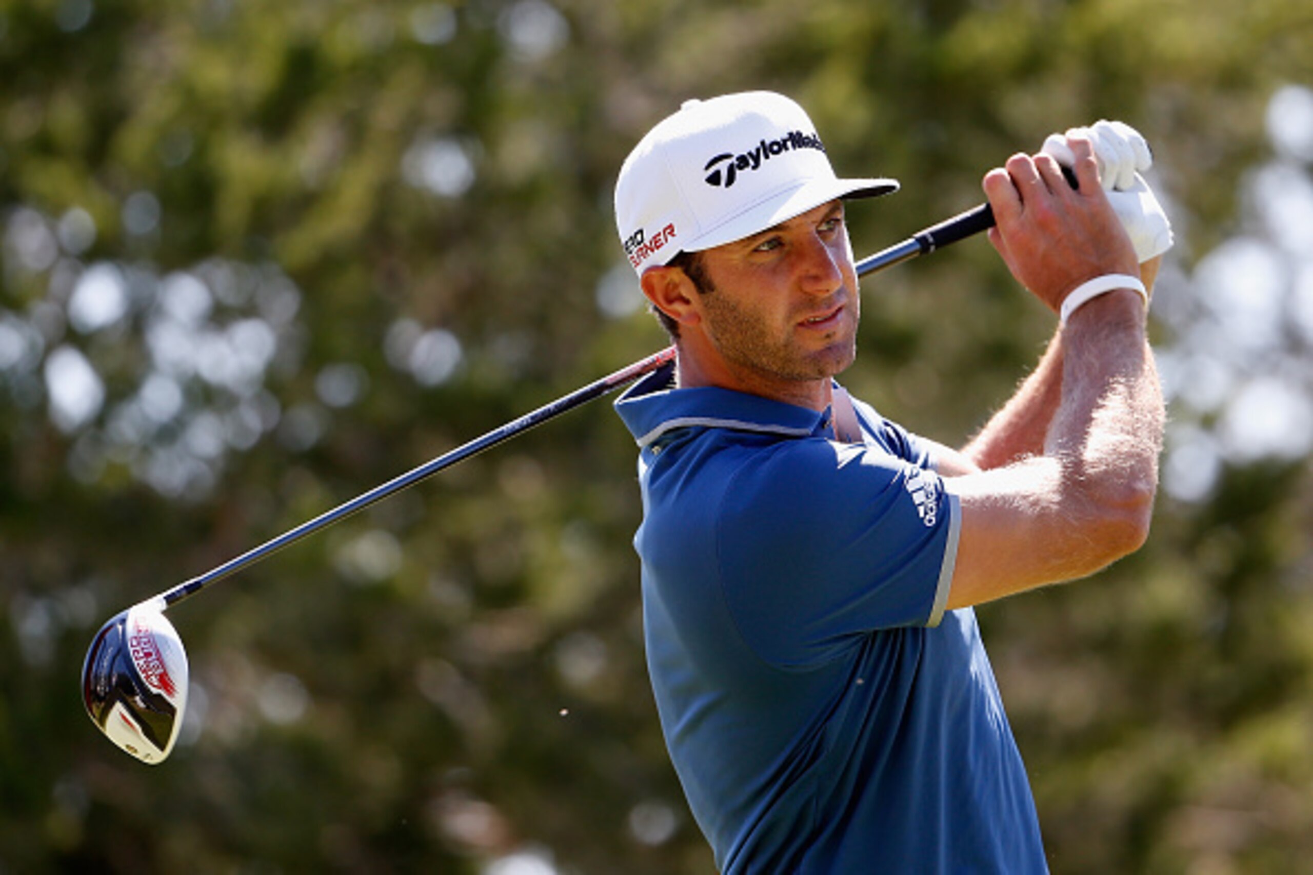 SAN ANTONIO, TX - MARCH 27:  Dustin Johnson tees off on the 12th hole during round two of the Valero Texas Open at TPC San Antonio AT&T Oaks Course on March 27, 2015 in San Antonio, Texas.  (Photo by Christian Petersen/Getty Images)