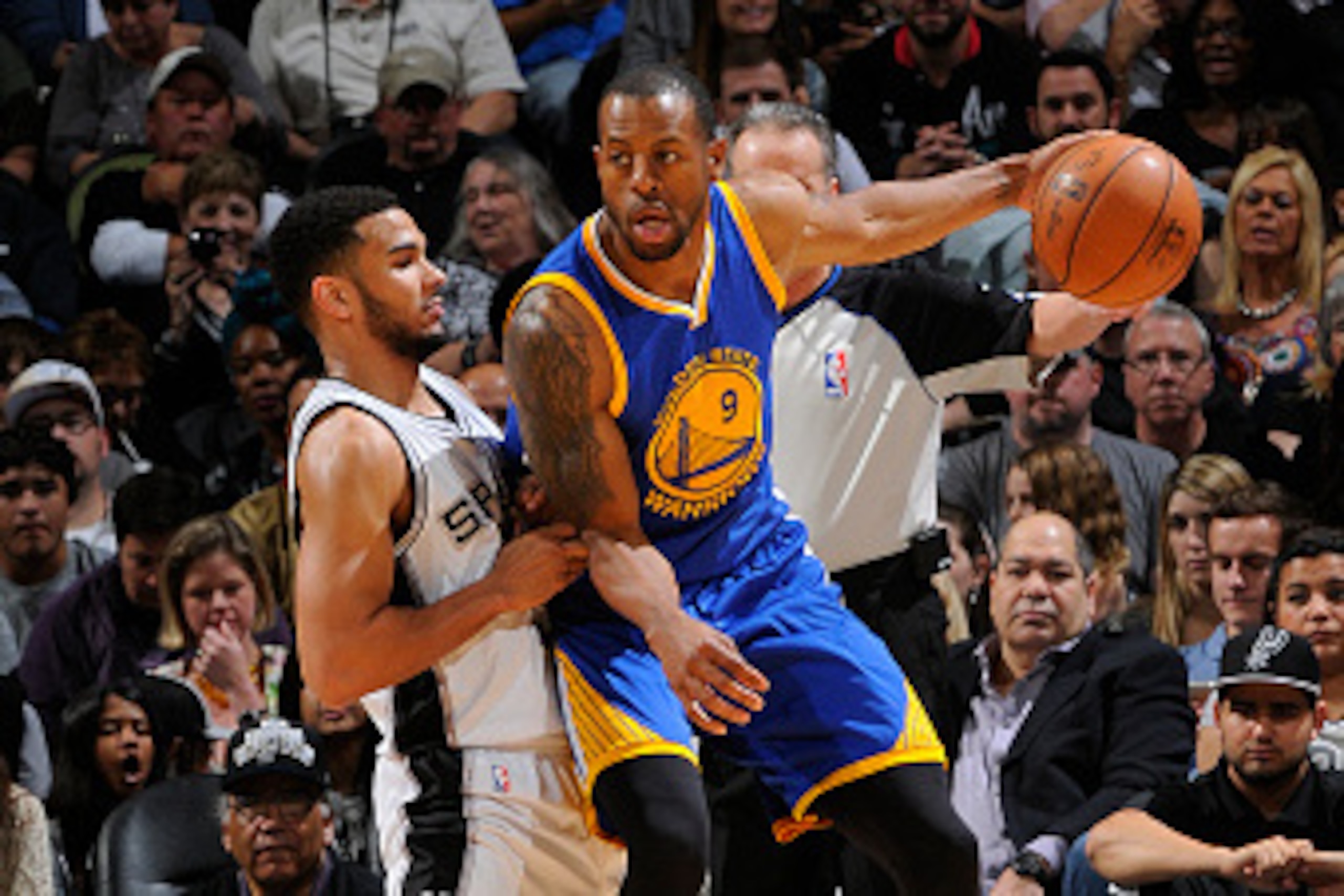 SAN ANTONIO, TX - APRIL 5: Andre Iguodala #9 of the Golden State Warriors handles the ball against Cory Joseph #5 of the San Antonio Spurs on April 5, 2015 at the AT&T Center in San Antonio, Texas. NOTE TO USER: User expressly acknowledges and agrees that SAN ANTONIO, TX - APRIL 5: Andre Iguodala #9 of the Golden State Warriors handles the ball against Cory Joseph #5 of the San Antonio Spurs on April 5, 2015 at the AT&T Center in San Antonio, Texas. NOTE TO USER: User expressly acknowledges and agrees that