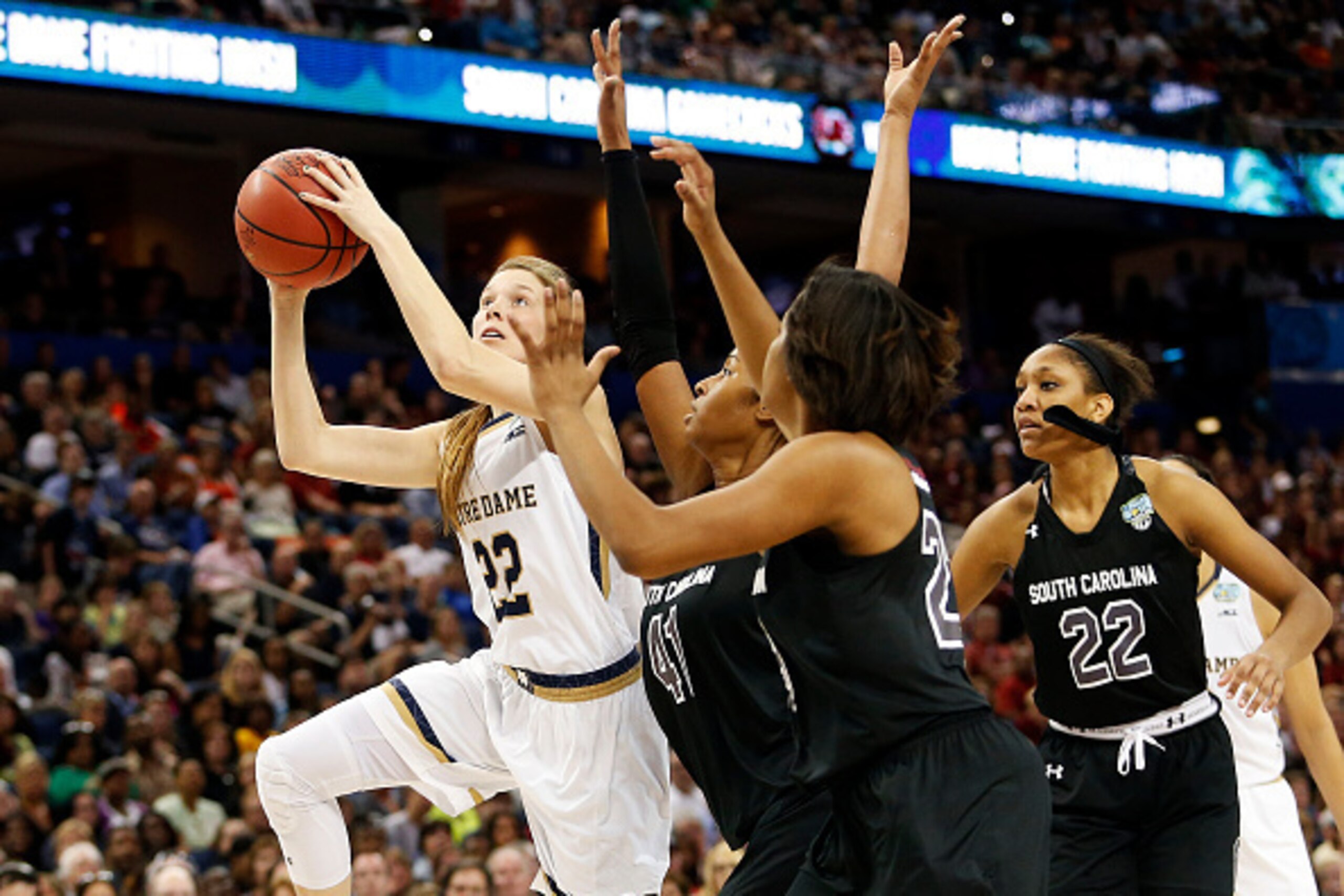 TAMPA, FL - APRIL 05:  Madison Cable #22 of the Notre Dame Fighting Irish shoots against the South Carolina Gamecocks in the second half during the NCAA Women's Final Four Semifinal at Amalie Arena on April 5, 2015 in Tampa, Florida.  (Photo by Brian Blan