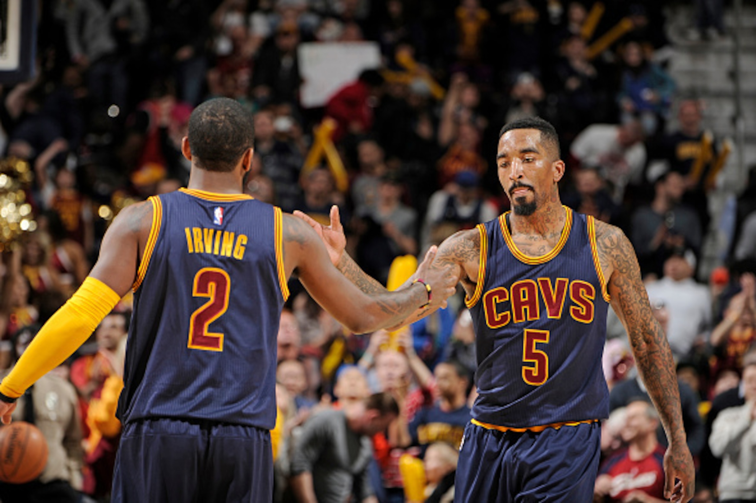 CLEVELAND, OH - APRIL 5: J.R. Smith #5 and Kyrie Irving #2 of the Cleveland Cavaliers celebrate during the game against the Chicago Bulls on April 5, 2015 at Quicken Loans Arena in Cleveland, Ohio. NOTE TO USER: User expressly acknowledges and agrees tha CLEVELAND, OH - APRIL 5: J.R. Smith #5 and Kyrie Irving #2 of the Cleveland Cavaliers celebrate during the game against the Chicago Bulls on April 5, 2015 at Quicken Loans Arena in Cleveland, Ohio. NOTE TO USER: User expressly acknowledges and agrees tha
