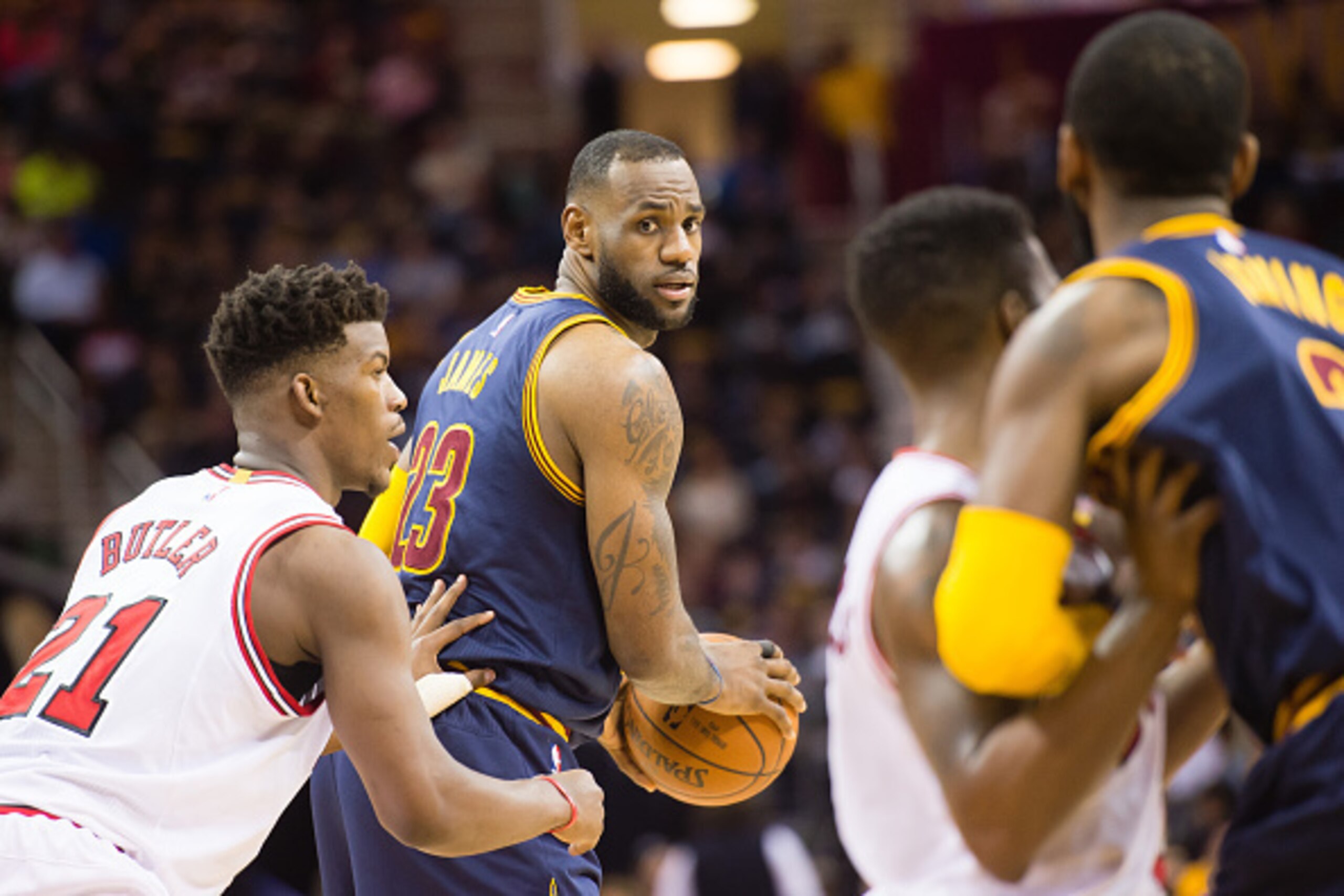 CLEVELAND, OH - APRIL 5: Jimmy Butler #21 of the Chicago Bulls guards LeBron James #23 of the Cleveland Cavaliers during the first half at Quicken Loans Arena on April 5, 2015 in Cleveland, Ohio. NOTE TO USER: User expressly acknowledges and agrees that, CLEVELAND, OH - APRIL 5: Jimmy Butler #21 of the Chicago Bulls guards LeBron James #23 of the Cleveland Cavaliers during the first half at Quicken Loans Arena on April 5, 2015 in Cleveland, Ohio. NOTE TO USER: User expressly acknowledges and agrees that,