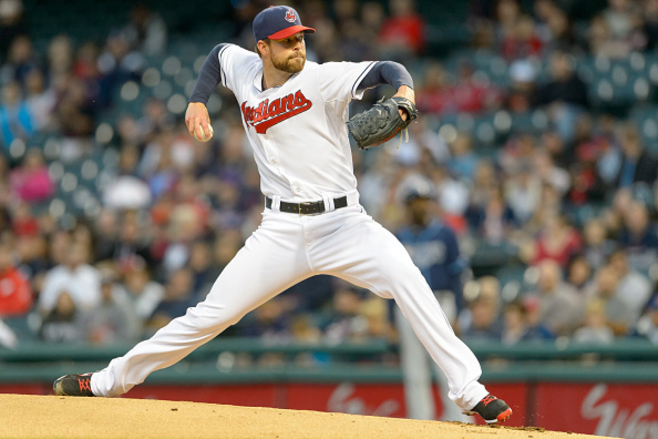 CLEVELAND, OH - SEPTEMBER 26: Starting pitcher Corey Kluber #28 of the Cleveland Indians pitches during the first inning against the Tampa Bay Rays at Progressive Field on September 26, 2014 in Cleveland, Ohio. (Photo by Jason Miller/Getty Images)