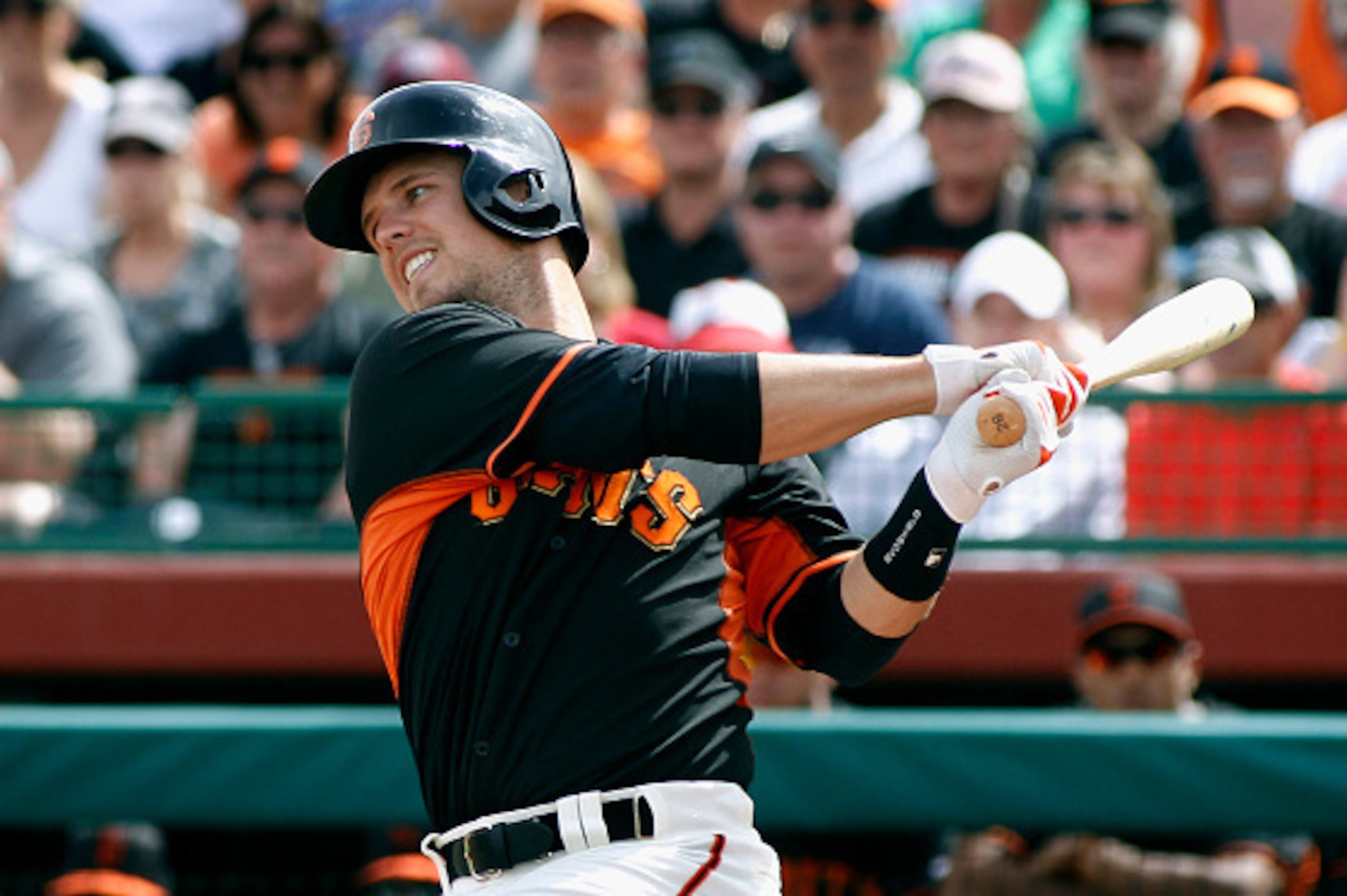 SCOTTSDALE, AZ - MARCH 11:  Buster Posey #28 of the San Francisco Giants swings at a pitch against the Milwaukee Brewers during the first inning of a Cactus League game at Scottsdale Stadium on March 11, 2015 in Scottsdale, Arizona.  (Photo by Ralph Freso