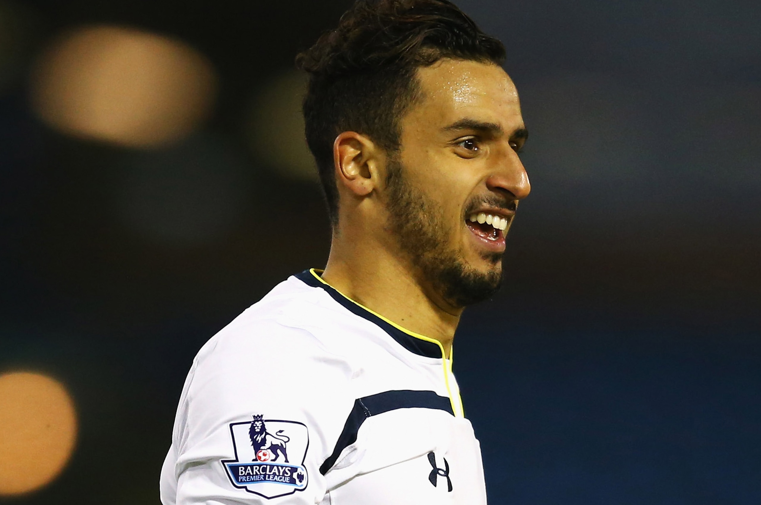 BURNLEY, ENGLAND - JANUARY 05:  Nacer Chadli of Tottenham Hotspur celebrates scoring the opening goal during the FA Cup Third Round match between Burnley and Tottenham Hotspur at Turf Moor on January 5, 2015 in Burnley, England.  (Photo by Richard Heathco