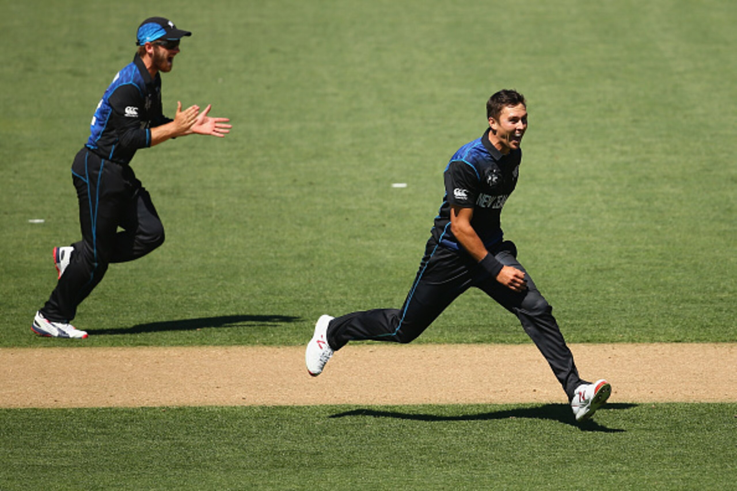 AUCKLAND, NEW ZEALAND - FEBRUARY 28: Grant Elliott and Trent Boult celebrate Boult taking the wicket of Mitch Marsh of Australia during the 2015 ICC Cricket World Cup match between Australia and New Zealand at Eden Park on February 28, 2015 in Auckland, AUCKLAND, NEW ZEALAND - FEBRUARY 28: Grant Elliott and Trent Boult celebrate Boult taking the wicket of Mitch Marsh of Australia during the 2015 ICC Cricket World Cup match between Australia and New Zealand at Eden Park on February 28, 2015 in Auckland,