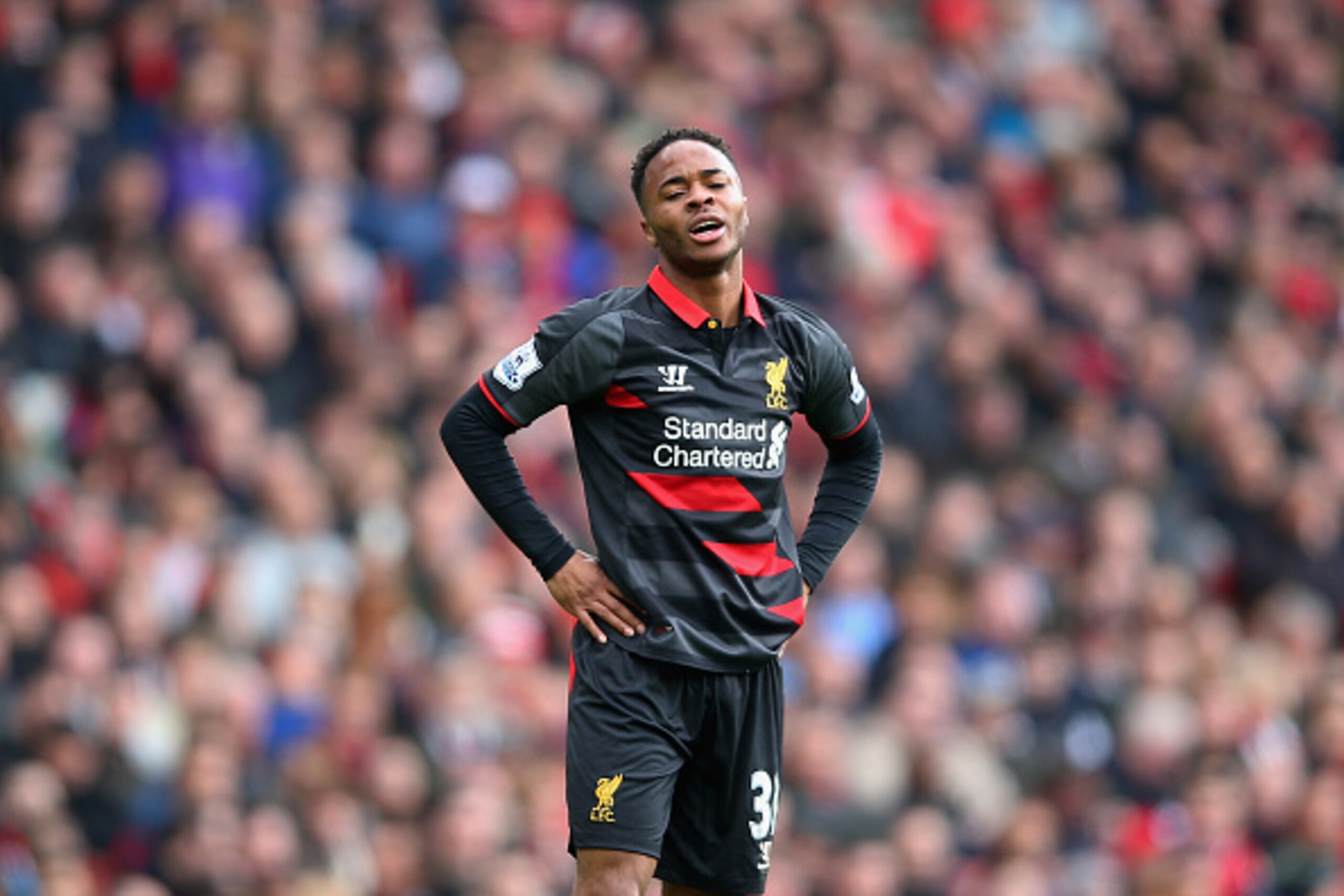 LONDON, ENGLAND - APRIL 04:  Raheem Sterling of Liverpool reacts after a missed opportunity during the Barclays Premier League match between Arsenal and Liverpool at Emirates Stadium on April 4, 2015 in London, England.  (Photo by Paul Gilham/Getty Images