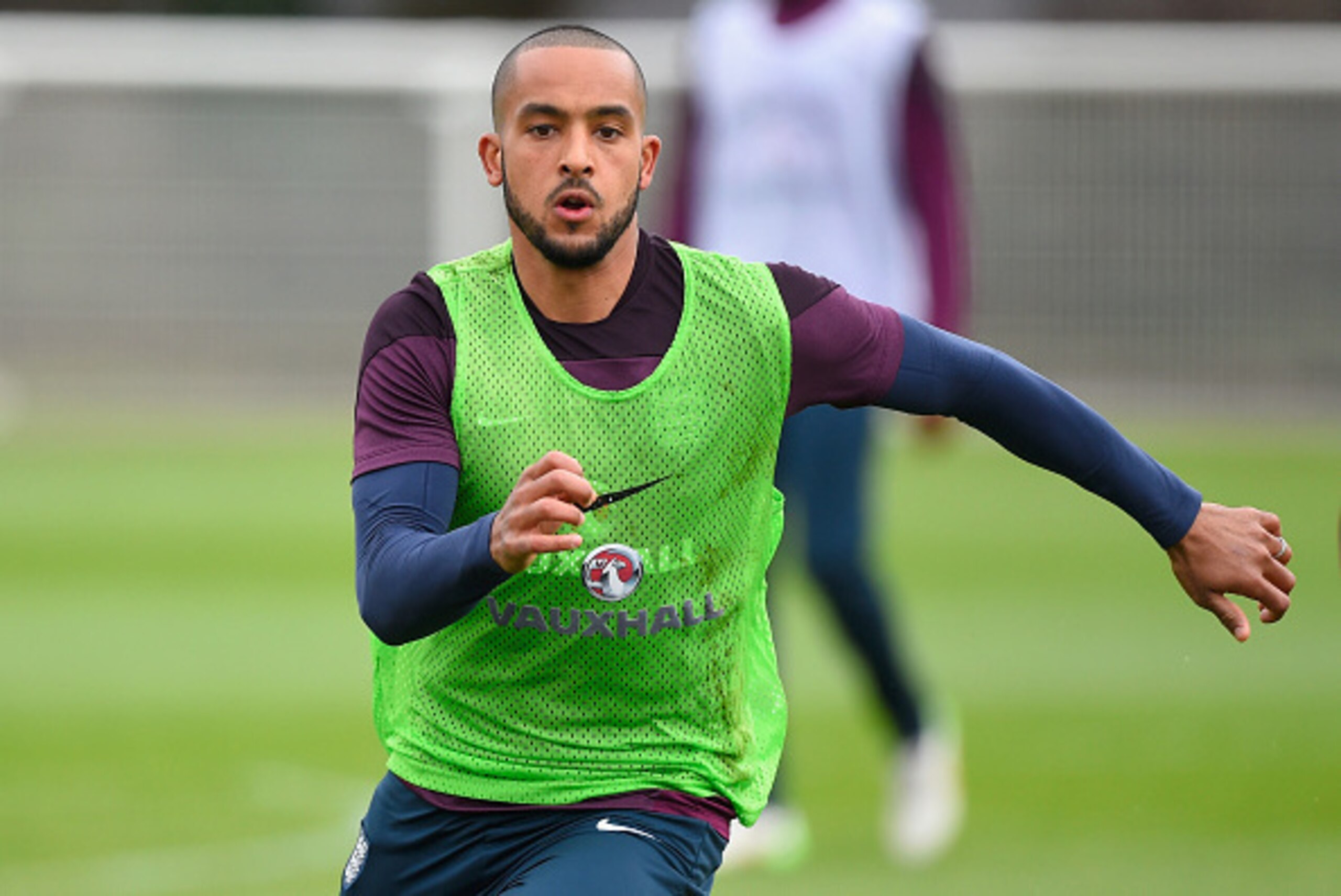 ENFIELD, ENGLAND - MARCH 26:  Theo Walcott of England runs during an England training session ahead of the Euro 2016 qualifier against Lithuania at Enfield Training Centre on March 26, 2015 in Enfield, England.  (Photo by Mike Hewitt/Getty Images)