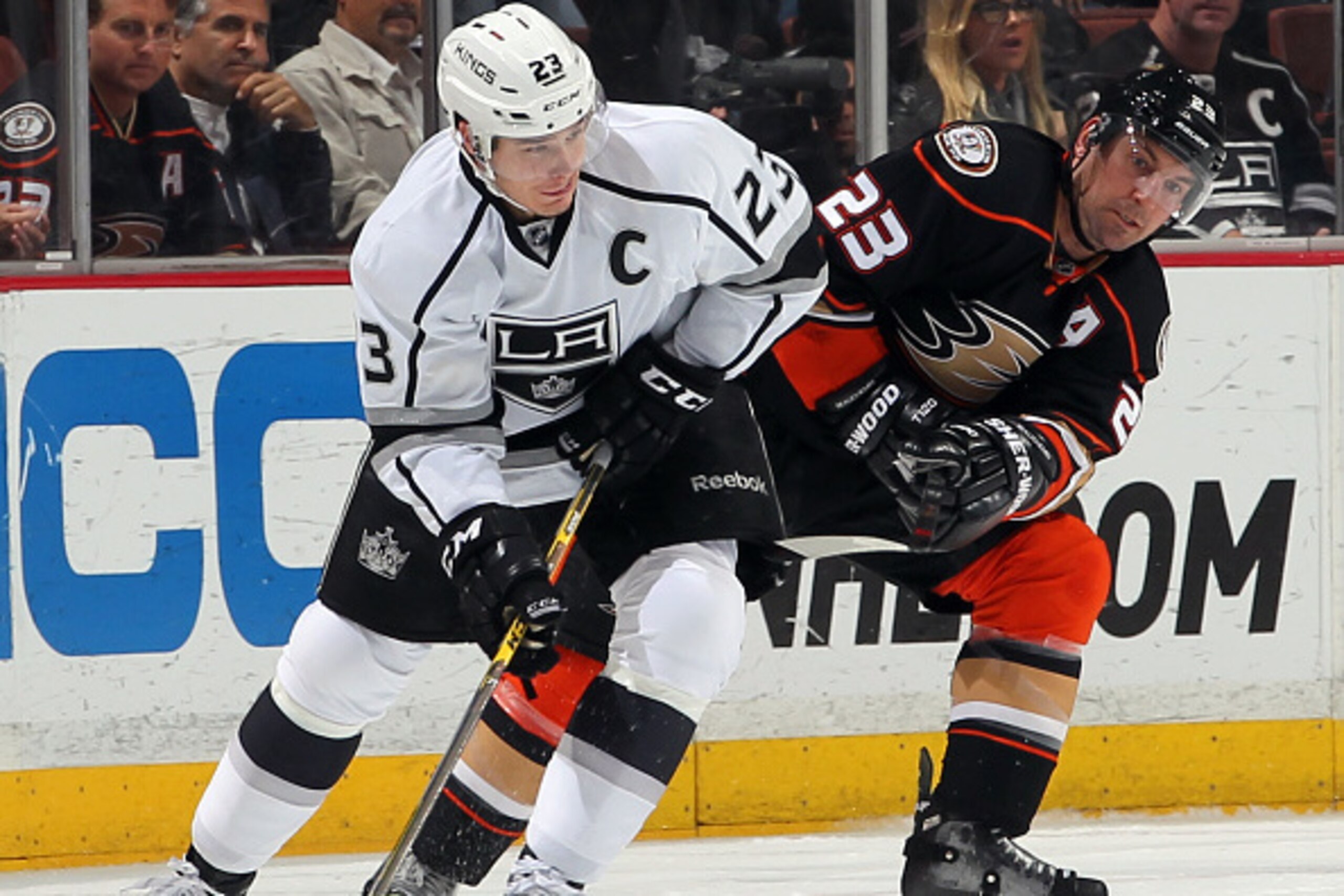 ANAHEIM, CA - FEBRUARY 27:  Dustin Brown #23 of the Los Angeles Kings battles for position against Francois Beauchemin #23 of the Anaheim Ducks on February 27, 2015 at Honda Center in Anaheim, California. (Photo by Debora Robinson/NHLI via Getty Images)