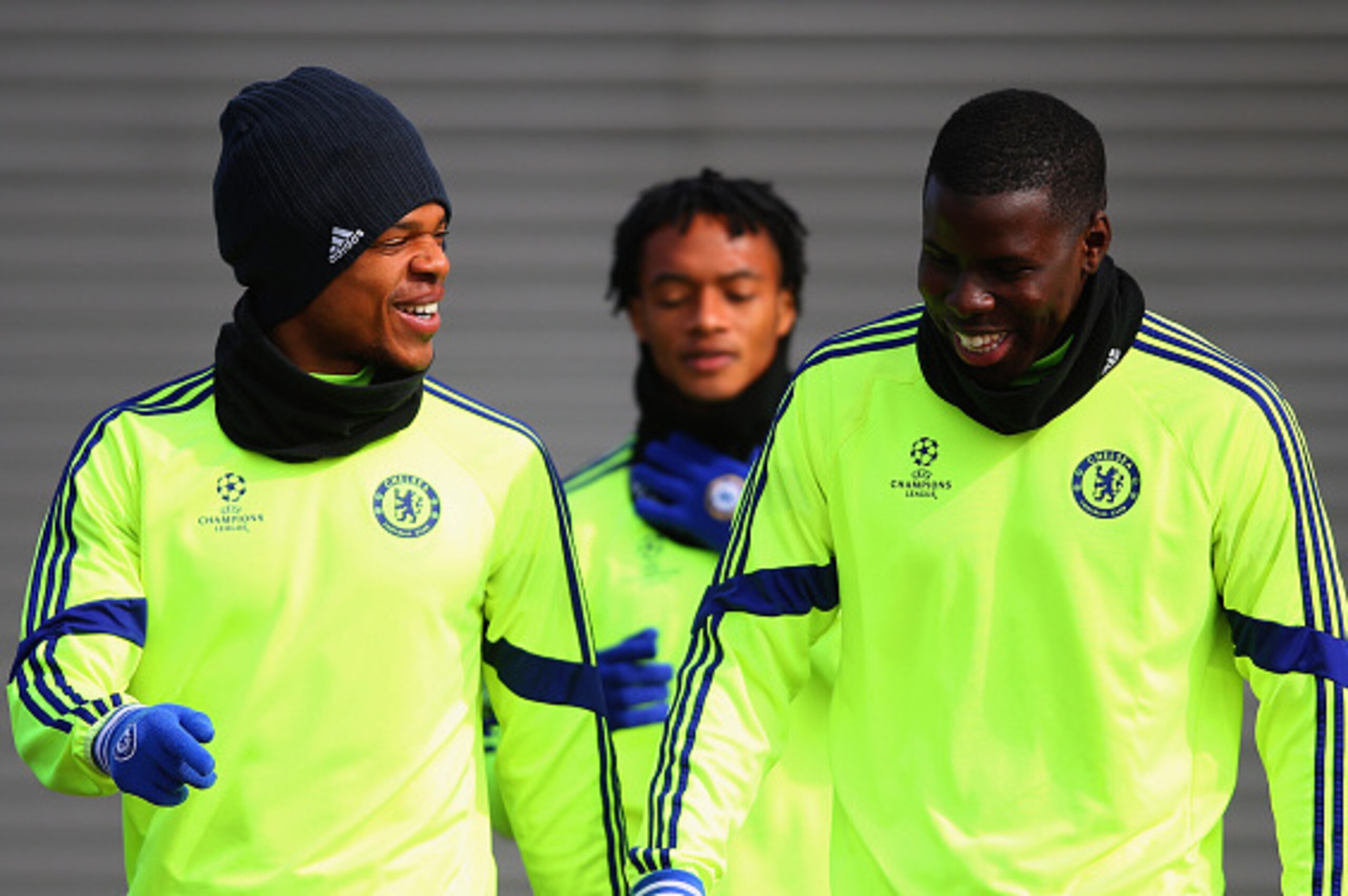 COBHAM, ENGLAND - MARCH 10:  Loic Remy (L) and Kurt Zouma in discussion during a Chelsea training session ahead of the UEFA Champions League Round of 16 second leg match against Paris Saint-Germain at Chelsea Training Ground on March 10, 2015 in Cobham, E