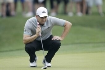 Apr 3, 2015; Humble, TX, USA; Sergio Garcia of Spain lines up his putt on the number one hole during the second round of the Shell Houston Open at Golf Club of Houston - The Tournament Course. Mandatory Credit: Erich Schlegel-USA TODAY Sports