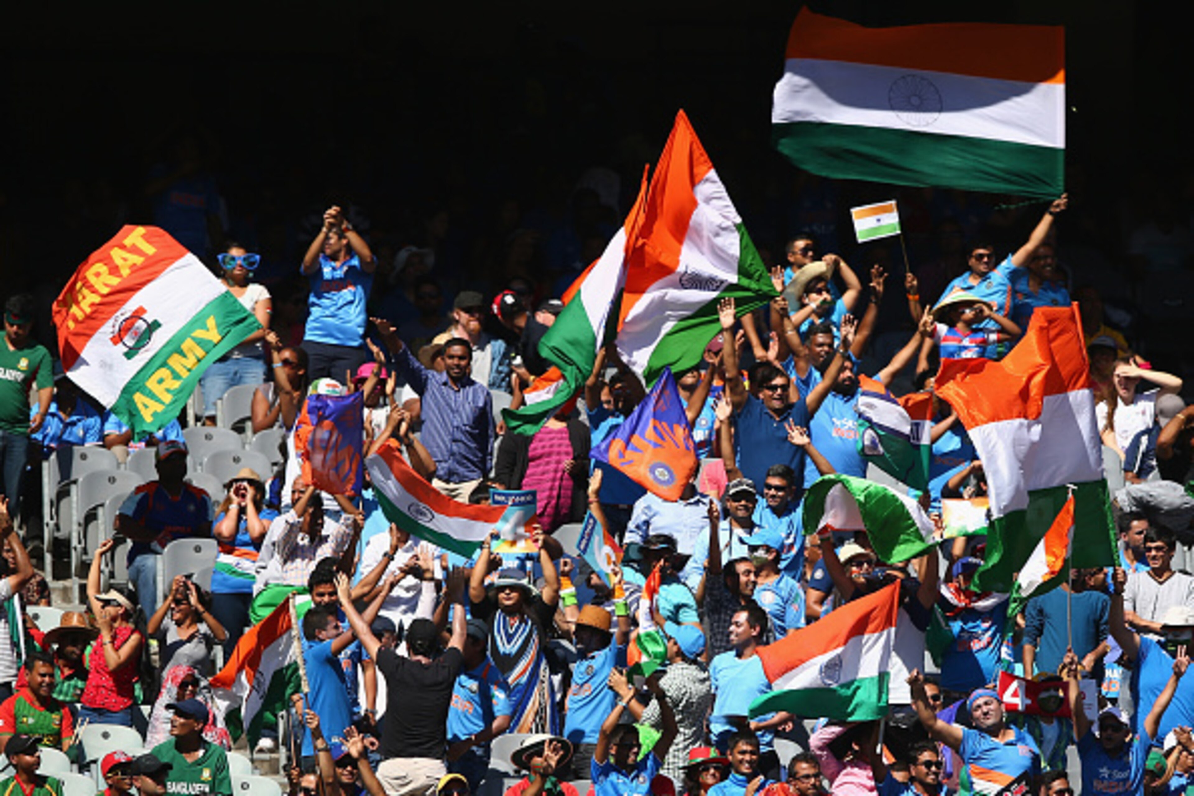 MELBOURNE, AUSTRALIA - MARCH 19: Fans cheer during the 2015 ICC Cricket World Cup match between India and Bangldesh at Melbourne Cricket Ground on March 19, 2015 in Melbourne, Australia.  (Photo by Robert Cianflone/Getty Images)