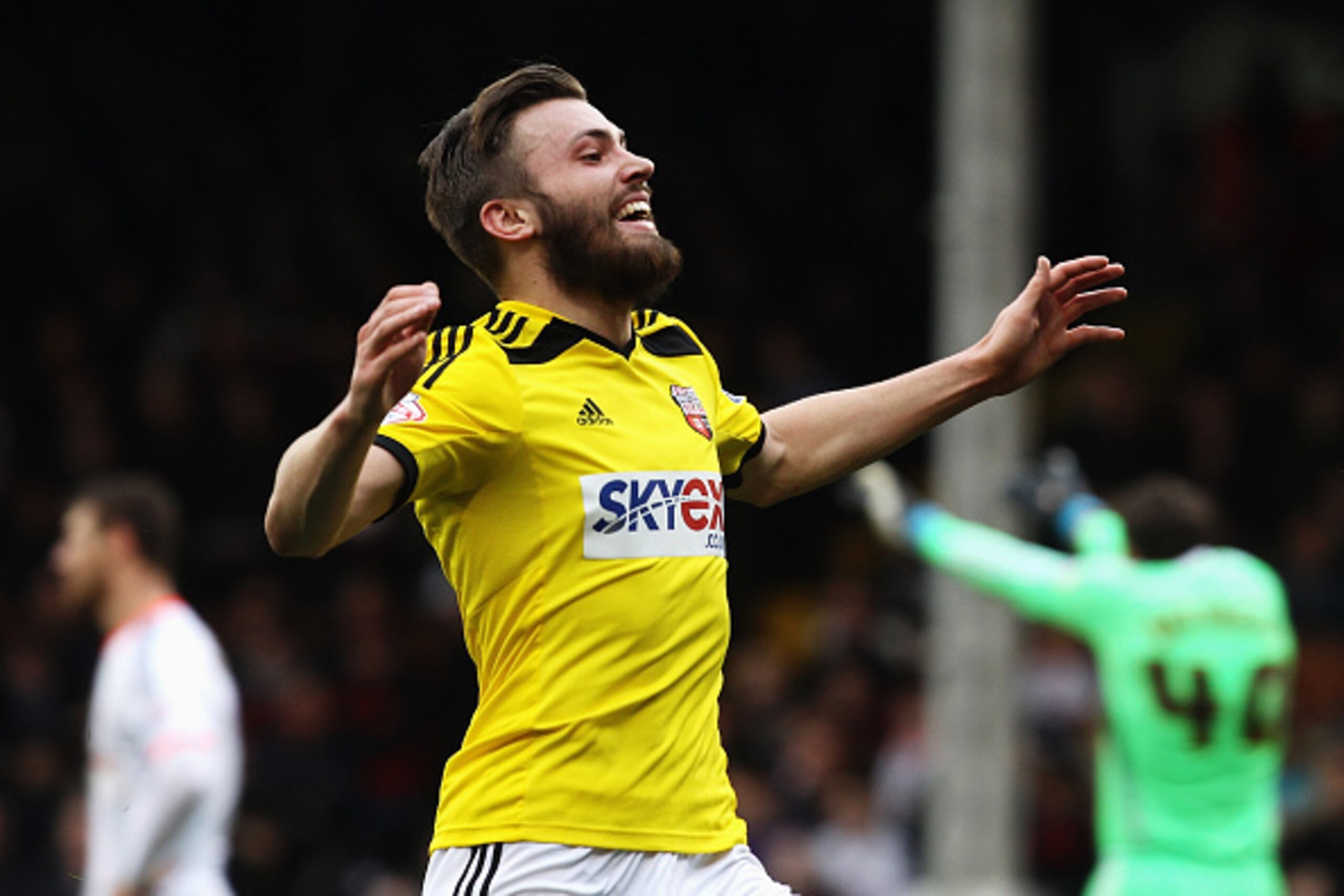LONDON, ENGLAND - APRIL 03:  Stuart Dallas of Brentford celebates scoring his second goal during the Sky Bet Championship match between Fulham and Brentford at Craven Cottage on April 3, 2015 in London, England.  (Photo by Ker Robertson/Getty Images)