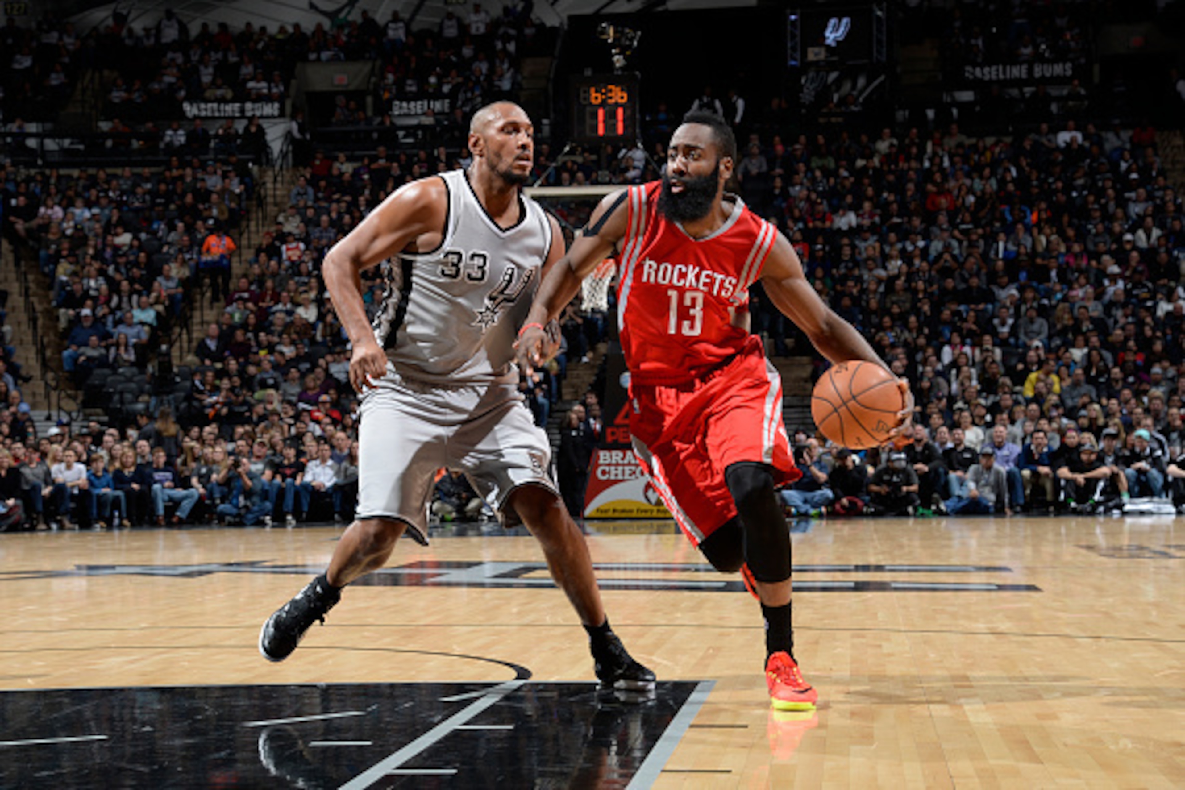SAN ANTONIO, TX - DECEMBER 28:  James Harden #13 of the Houston Rockets handles the ball against the San Antonio Spurs during the game on December 28, 2014 at the AT&T Center in San Antonio, Texas. NOTE TO USER: User expressly acknowledges and agrees that