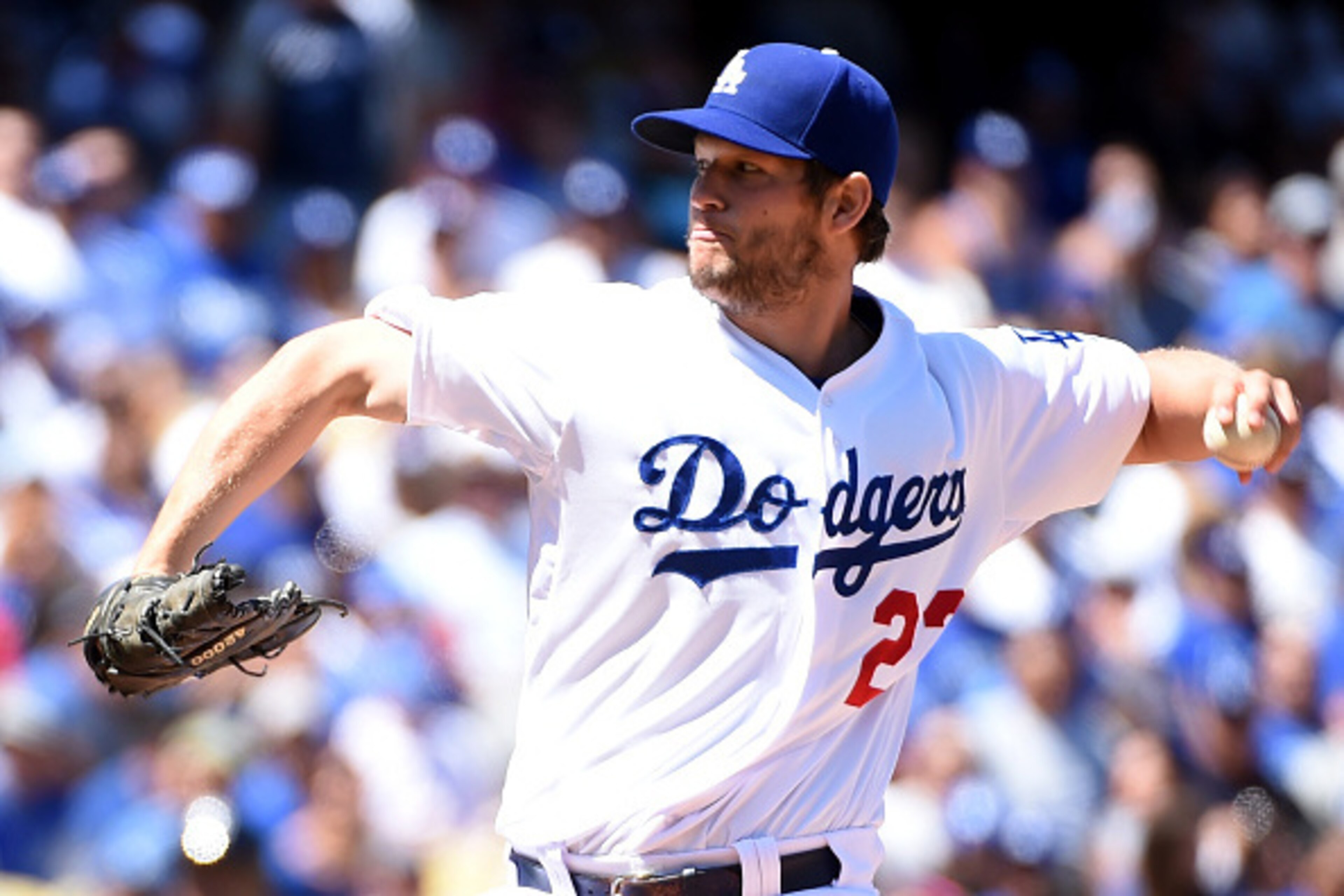 LOS ANGELES, CA - APRIL 06:  Clayton Kershaw #22 of the Los Angeles Dodgers pitches to the San Diego Padres in the first inning during opening day at Dodger Stadium on April 6, 2015 in Los Angeles, California.  (Photo by Harry How/Getty Images)