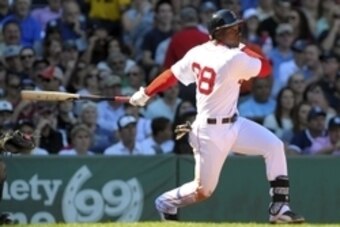 Sep 27, 2014; Boston, MA, USA; Boston Red Sox center fielder Rusney Castillo (38) hits an RBI single during the second inning against the New York Yankees at Fenway Park. Mandatory Credit: Bob DeChiara-USA TODAY Sports