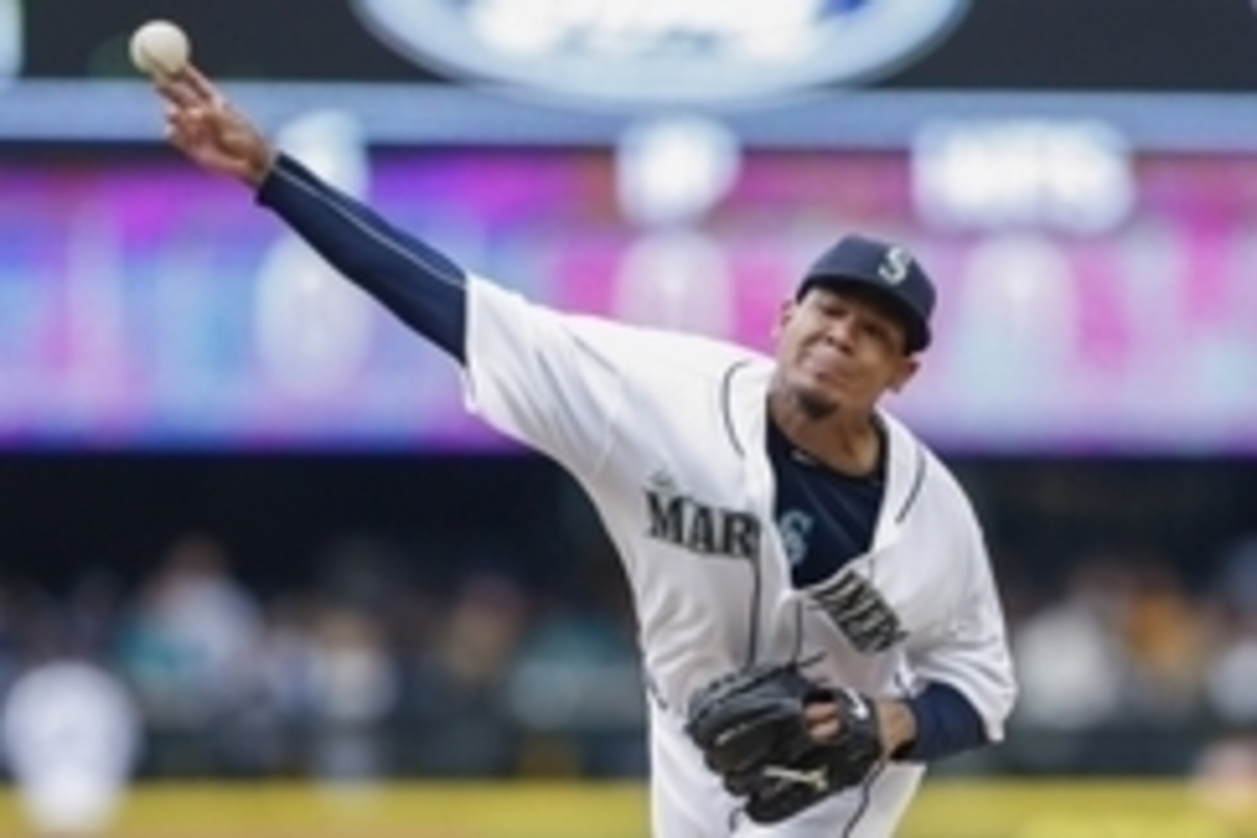 Apr 6, 2015; Seattle, WA, USA; Seattle Mariners pitcher Felix Hernandez (34) throws against the Los Angeles Angels  during the seventh inning at Safeco Field. Mandatory Credit: Joe Nicholson-USA TODAY Sports