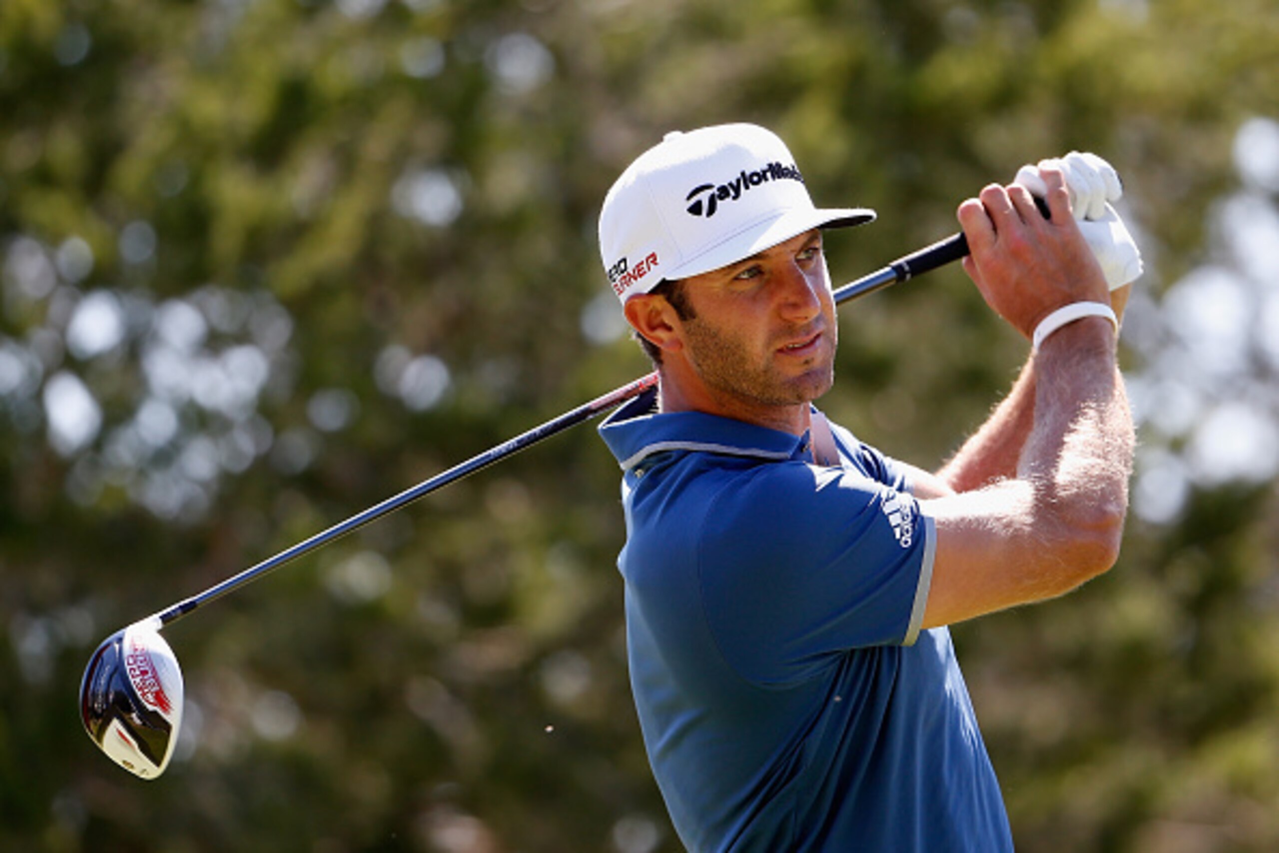 SAN ANTONIO, TX - MARCH 27:  Dustin Johnson tees off on the 12th hole during round two of the Valero Texas Open at TPC San Antonio AT&T Oaks Course on March 27, 2015 in San Antonio, Texas.  (Photo by Christian Petersen/Getty Images)