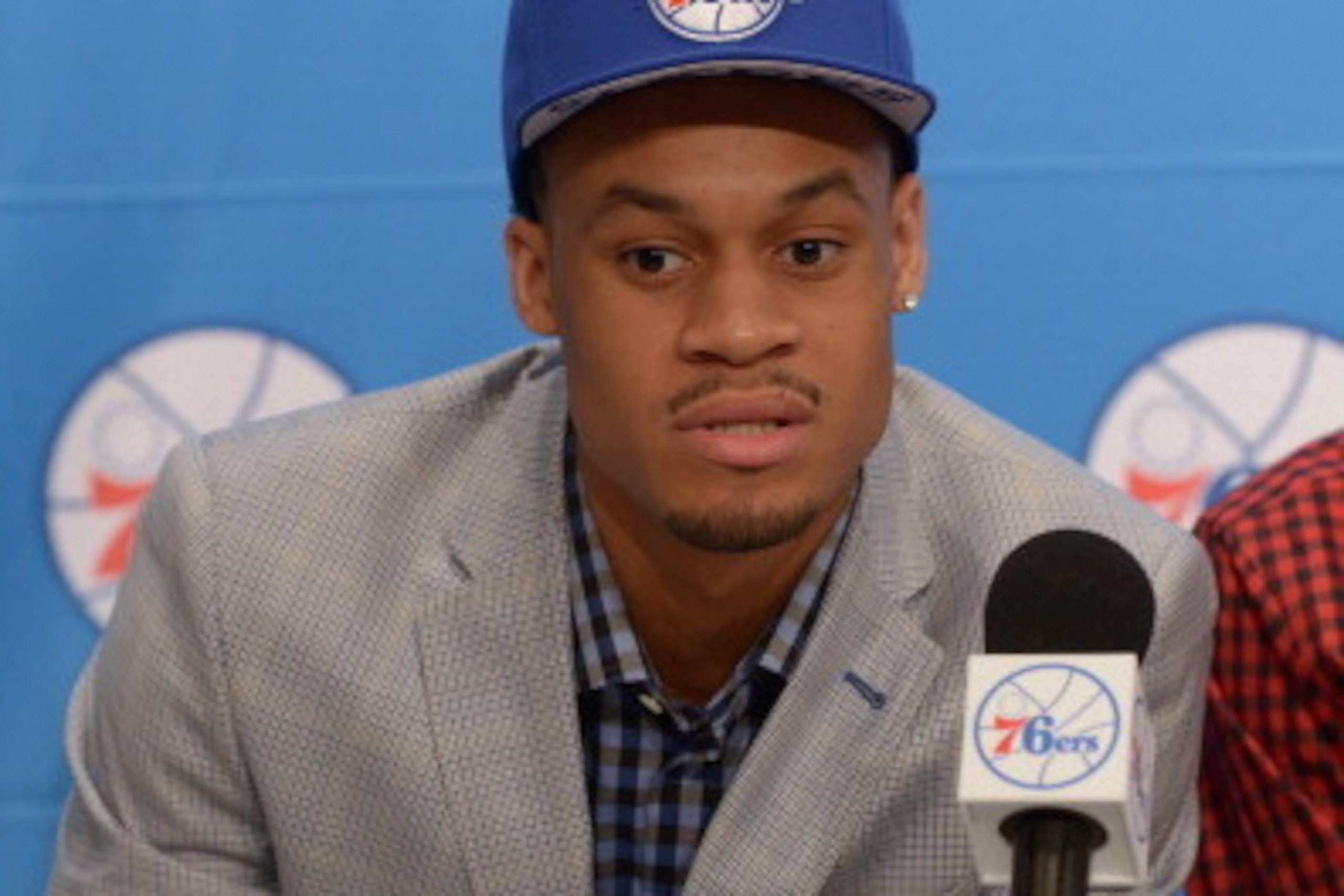 PHILADELPHIA, PA - JUNE 28: K.J. McDaniels #11 of the Philadelphia 76ers speaks to the media after being drafted by the Philadelphia 76ers at the Wells Fargo Center on June 28, 2014 in the Philadelphia, Pennsylvania. NOTE TO USER: User expressly acknowle PHILADELPHIA, PA - JUNE 28: K.J. McDaniels #11 of the Philadelphia 76ers speaks to the media after being drafted by the Philadelphia 76ers at the Wells Fargo Center on June 28, 2014 in the Philadelphia, Pennsylvania. NOTE TO USER: User expressly acknowle