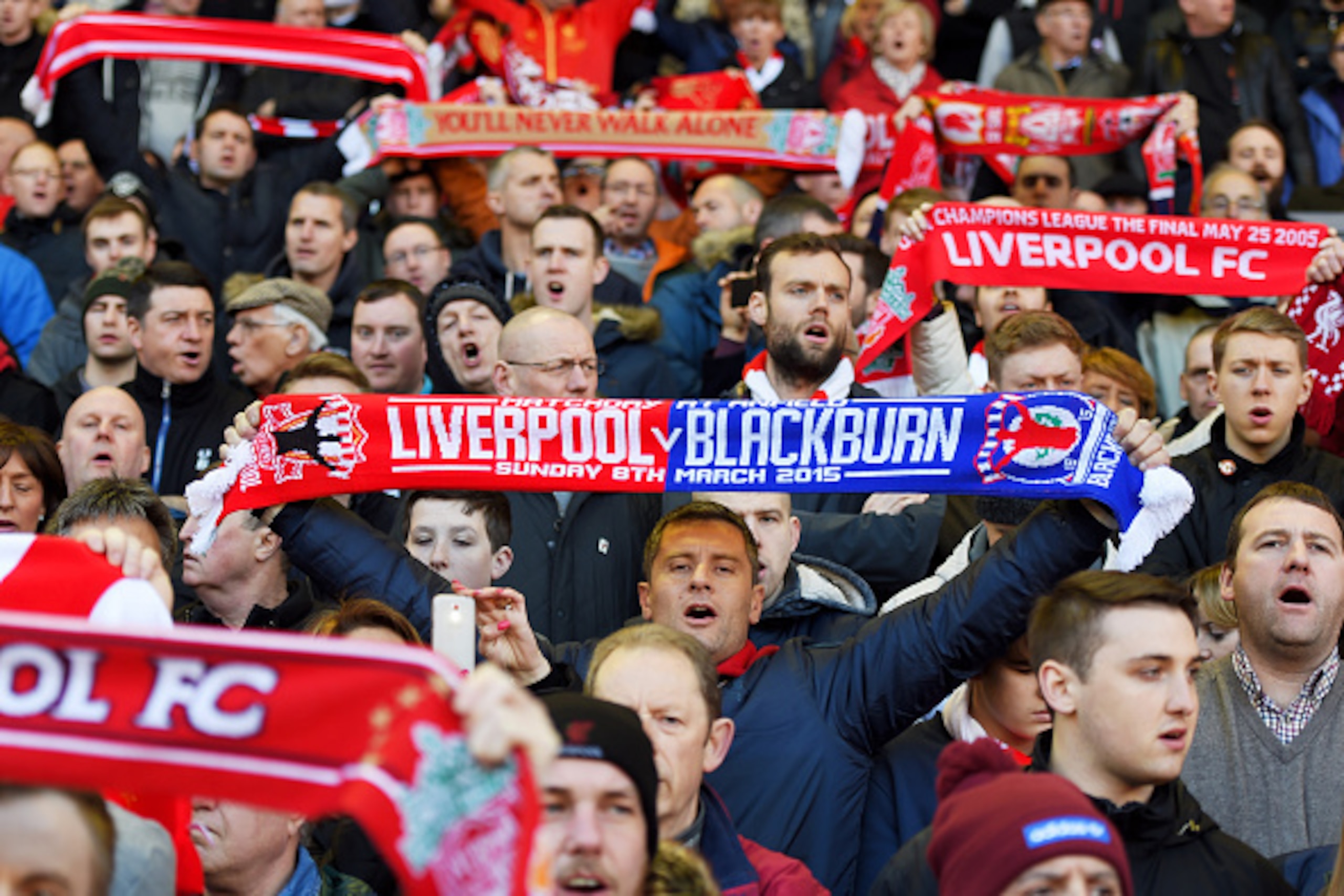 LIVERPOOL, ENGLAND - MARCH 08:  Liverpool fans cheer on their team during the FA Cup Quarter Final match between Liverpool and Blackburn Rovers at Anfield on March 8, 2015 in Liverpool, England.  (Photo by Michael Regan/Getty Images)