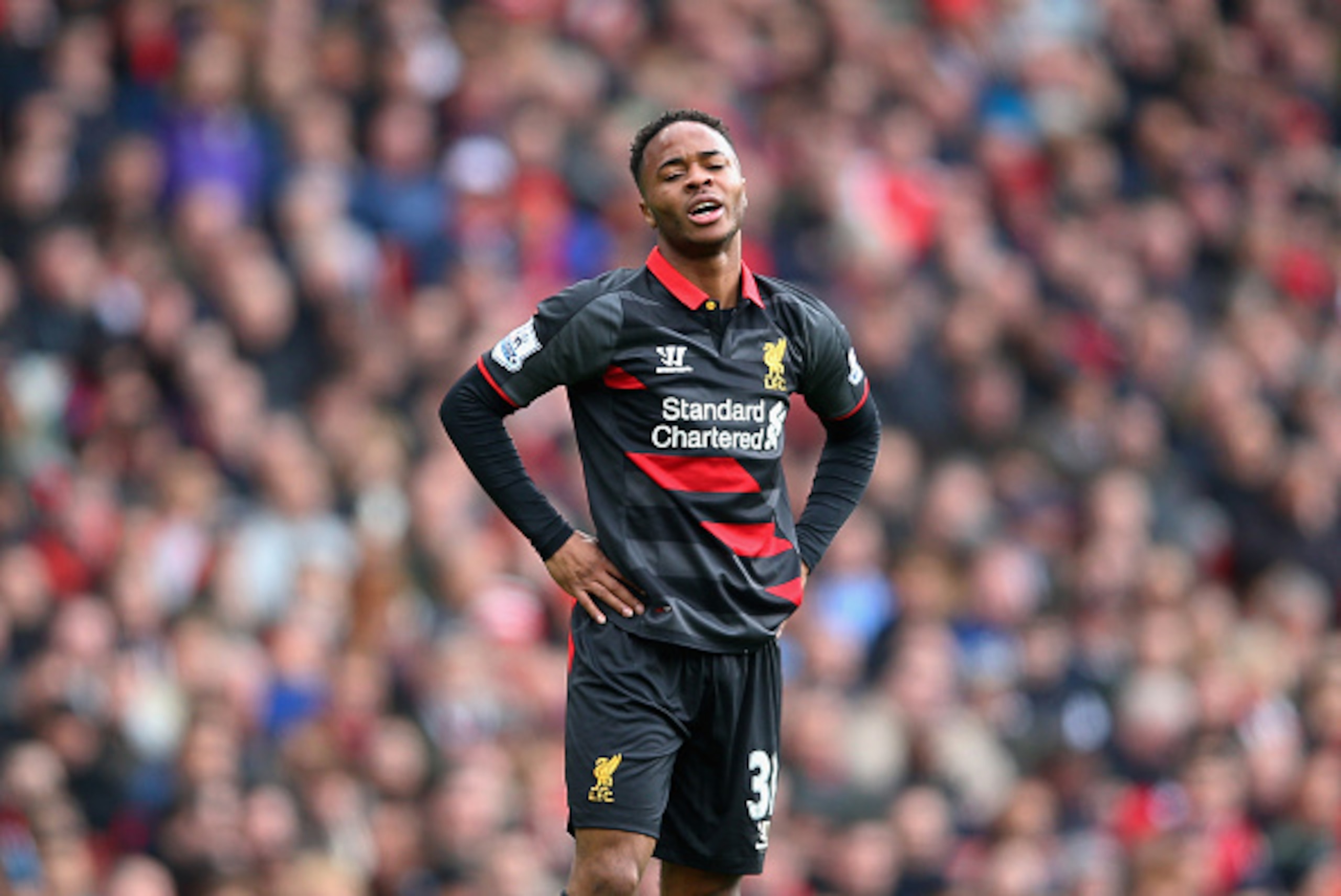 LONDON, ENGLAND - APRIL 04:  Raheem Sterling of Liverpool reacts after a missed opportunity during the Barclays Premier League match between Arsenal and Liverpool at Emirates Stadium on April 4, 2015 in London, England.  (Photo by Paul Gilham/Getty Images