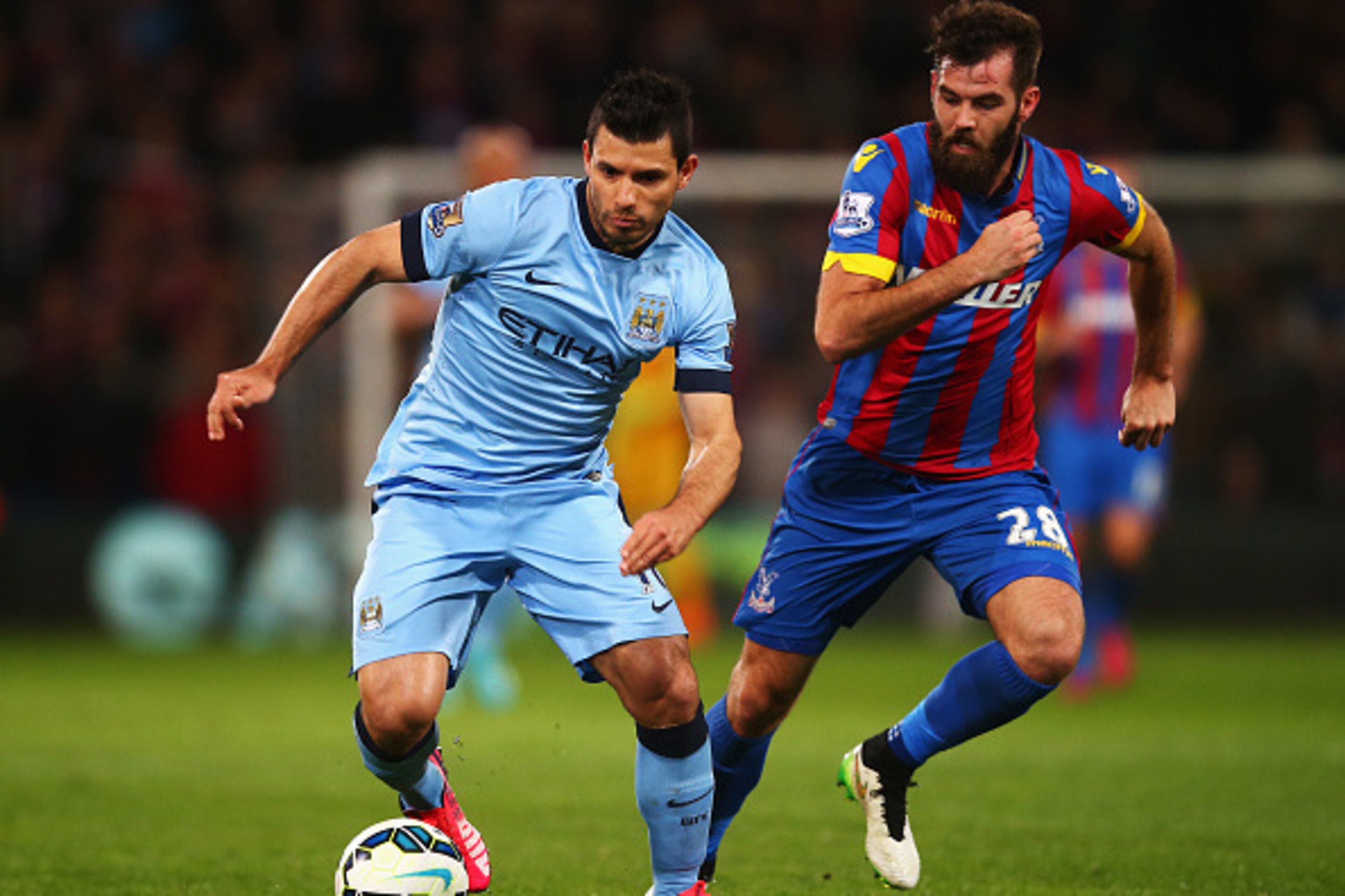 LONDON, ENGLAND - APRIL 06: Sergio Aguero of Manchester City is closed down by Joe Ledley of Crystal Palace during the Barclays Premier League match between Crystal Palace and Manchester City at Selhurst Park on April 6, 2015 in London, England.  (Photo b