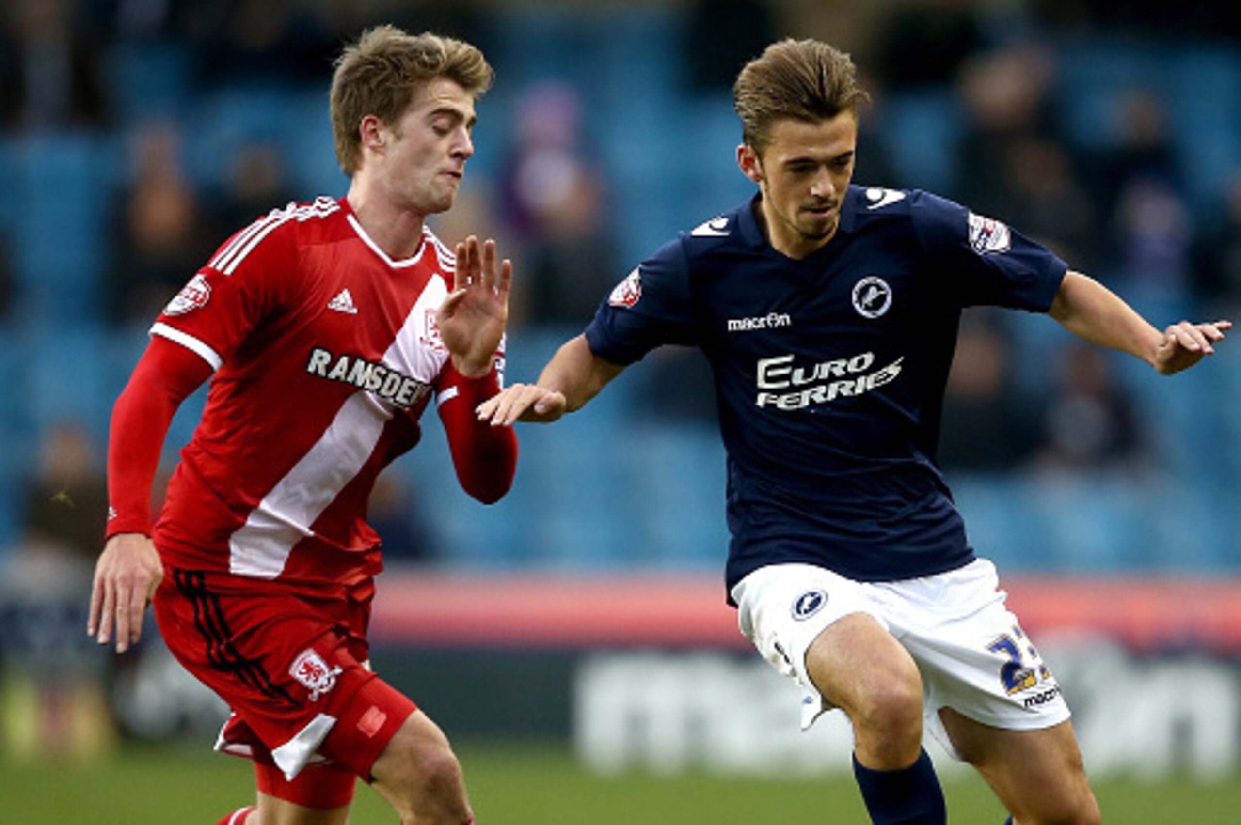LONDON, ENGLAND - DECEMBER 06: Jack Powell of Millwall controls the ball under pressure from Patrick Bamford of Middlesbrough during the Sky Bet Championship match between Millwall and Middlesbrough at The Den on December 6, 2014 in London, England. (Ph LONDON, ENGLAND - DECEMBER 06: Jack Powell of Millwall controls the ball under pressure from Patrick Bamford of Middlesbrough during the Sky Bet Championship match between Millwall and Middlesbrough at The Den on December 6, 2014 in London, England. (Ph