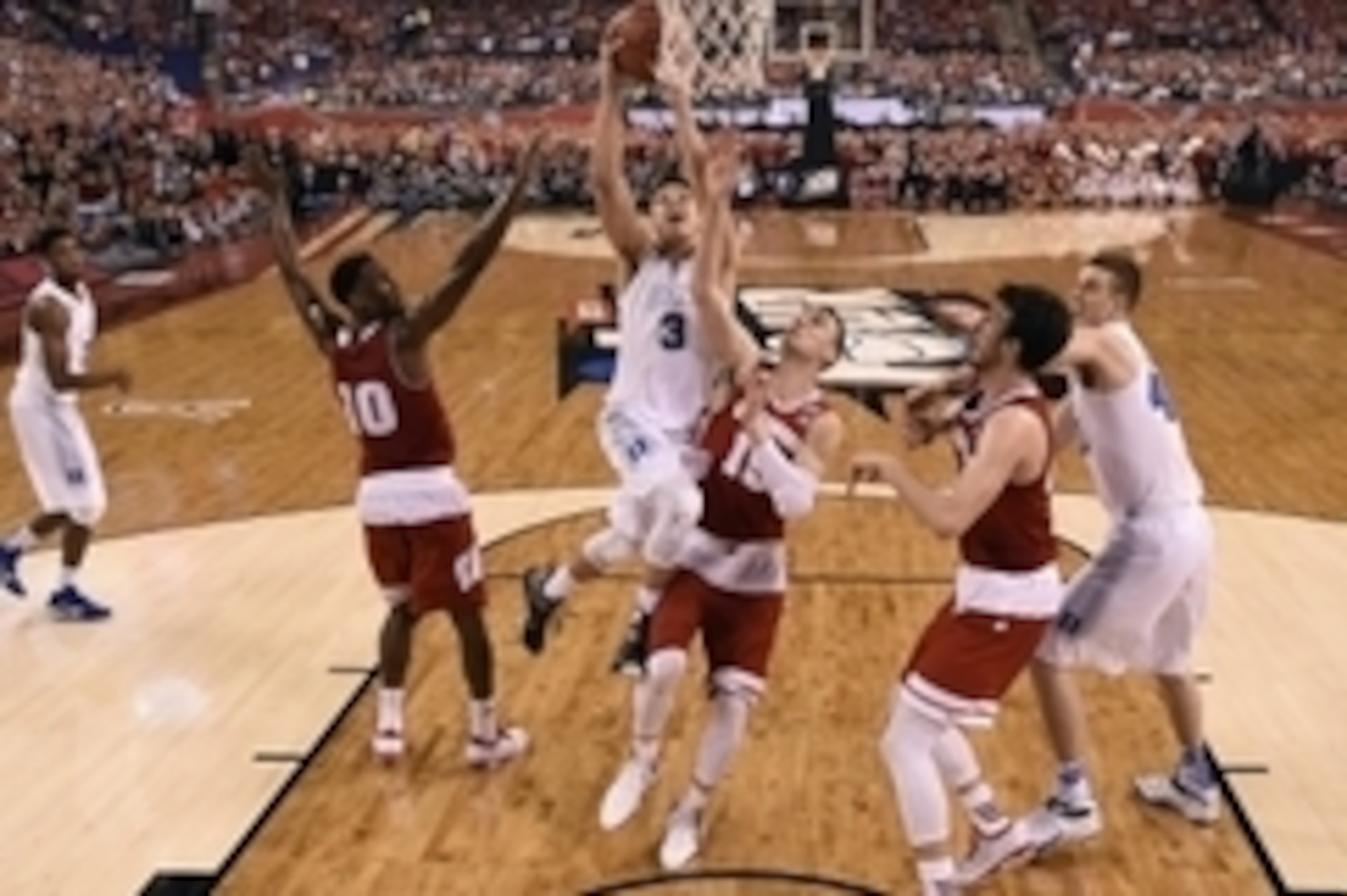 Apr 6, 2015; Indianapolis, IN, USA; Duke Blue Devils guard Grayson Allen (3) shoots the ball against Wisconsin Badgers forward Sam Dekker (15) during the second half in the 2015 NCAA Men's Division I Championship game at Lucas Oil Stadium. Mandatory Credi