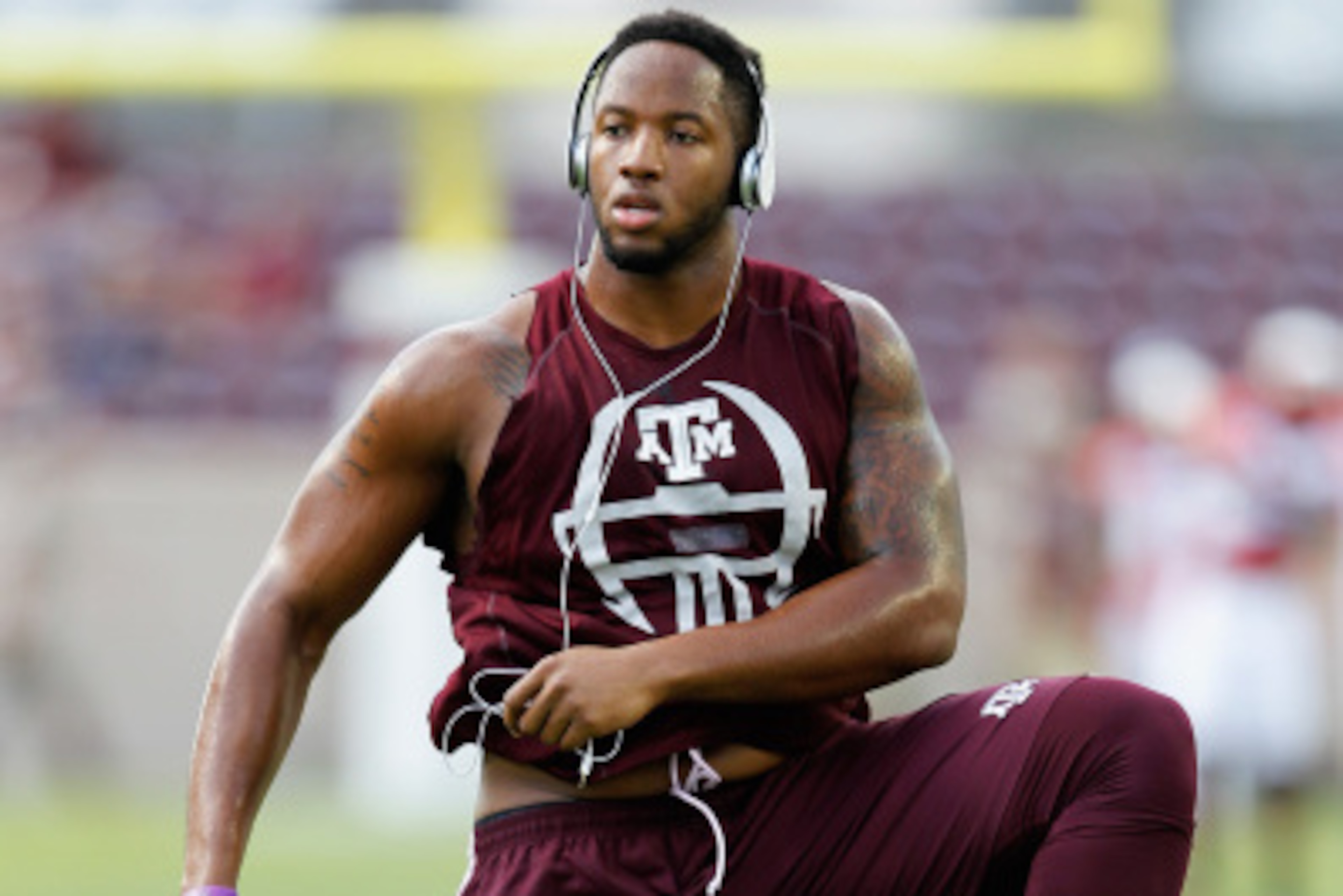 COLLEGE STATION, TX - SEPTEMBER 06:  Cedric Ogbuehi #70 of the Texas A&M Aggies warms up before playing the Lamar Cardinals at Kyle Field on September 6, 2014 in College Station, Texas.  (Photo by Bob Levey/Getty Images)