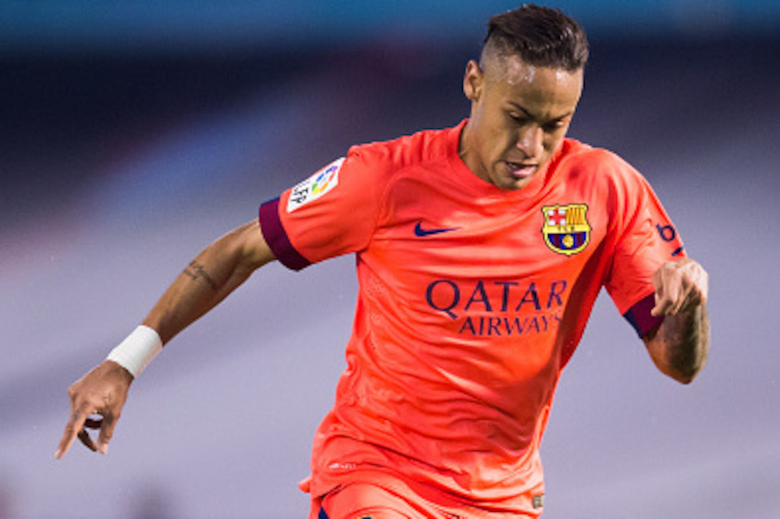 VIGO, SPAIN - APRIL 05:  Neymar Santos Jr of FC Barcelona runs with the ball during the La Liga match between Celta Vigo and FC Barcelona at Estadio Balaidos on April 5, 2015 in Vigo, Spain.  (Photo by Alex Caparros/Getty Images)