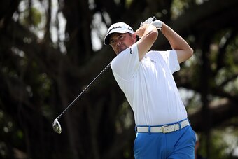 DORAL, FL - MARCH 05:  Ryan Palmer of the United States plays a shot on the fifth hole during the first round of the World Golf Championships-Cadillac Championship at Trump National Doral Blue Monster Course on March 5, 2015 in Doral, Florida.  (Photo by 