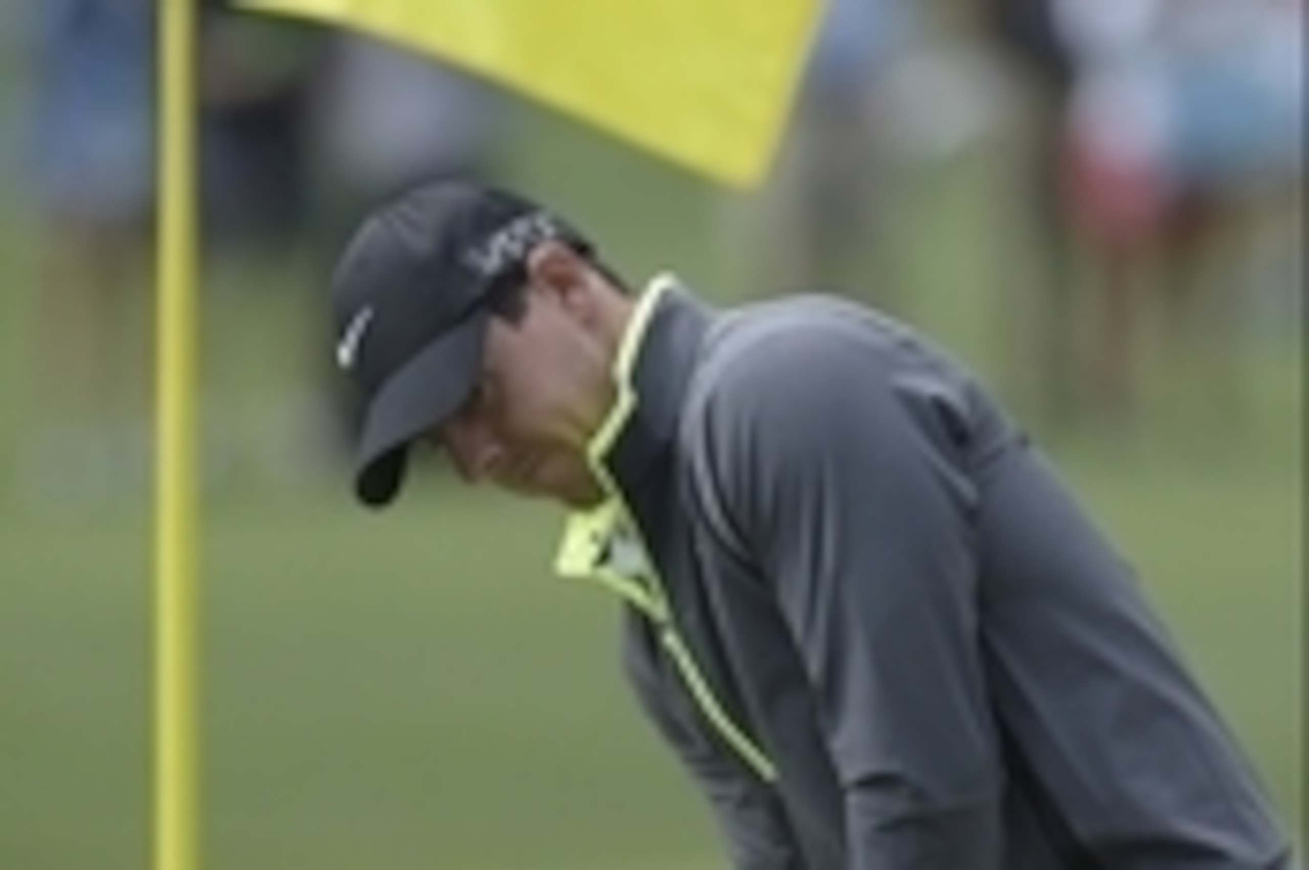 Apr 6, 2015; Augusta, GA, USA;  Rory McIlroy watches his putt on the 6th green during a practice round for The Masters golf tournament at Augusta National Golf Club. Mandatory Credit: Michael Madrid-USA TODAY Sports