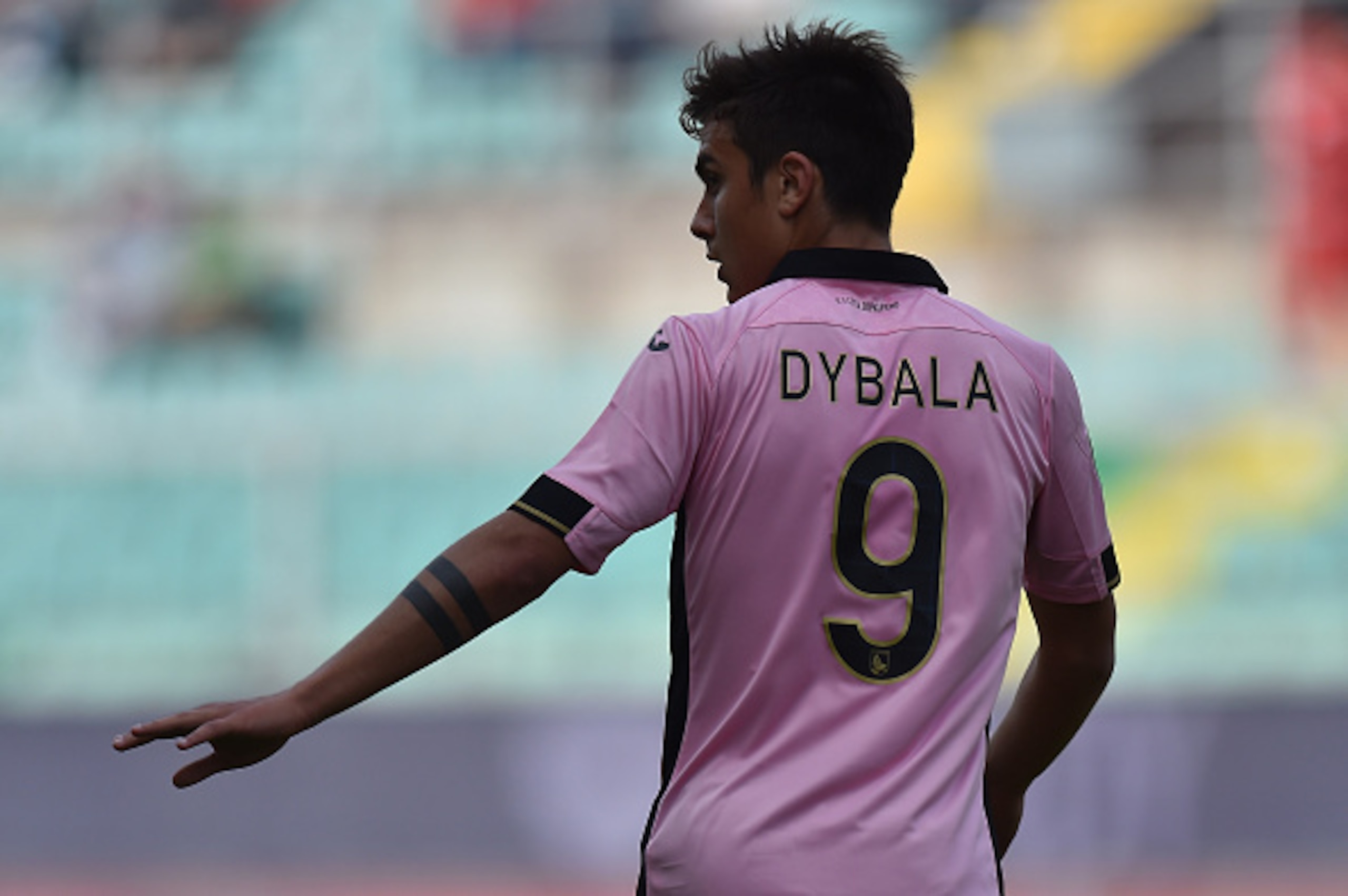 PALERMO, ITALY - APRIL 04:  Paulo Dybala of Palermo looks on during the Serie A match between US Citta di Palermo and AC Milan at Stadio Renzo Barbera on April 4, 2015 in Palermo, Italy.  (Photo by Tullio M. Puglia/Getty Images)