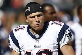 EAST RUTHERFORD, NJ - OCTOBER 20:   Austin Collie #10 of the New England Patriots walks on the sidelines during their game against the New York Jets at MetLife Stadium on October 20, 2013 in East Rutherford, New Jersey.  (Photo by Jeff Zelevansky/Getty Im