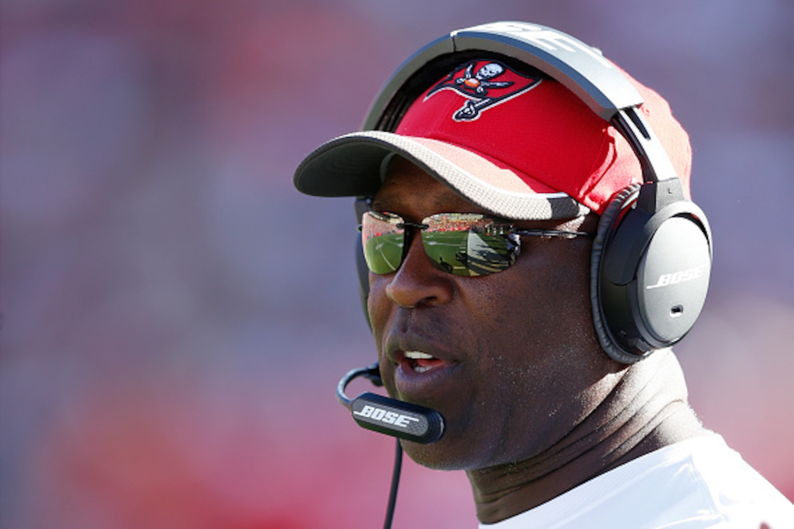TAMPA, FL - DECEMBER 28: Head coach Lovie Smith of the Tampa Bay Buccaneers looks on in the second half of the game against the New Orleans Saints at Raymond James Stadium on December 28, 2014 in Tampa, Florida. The Saints defeated the Bucs 23-20. (Photo 