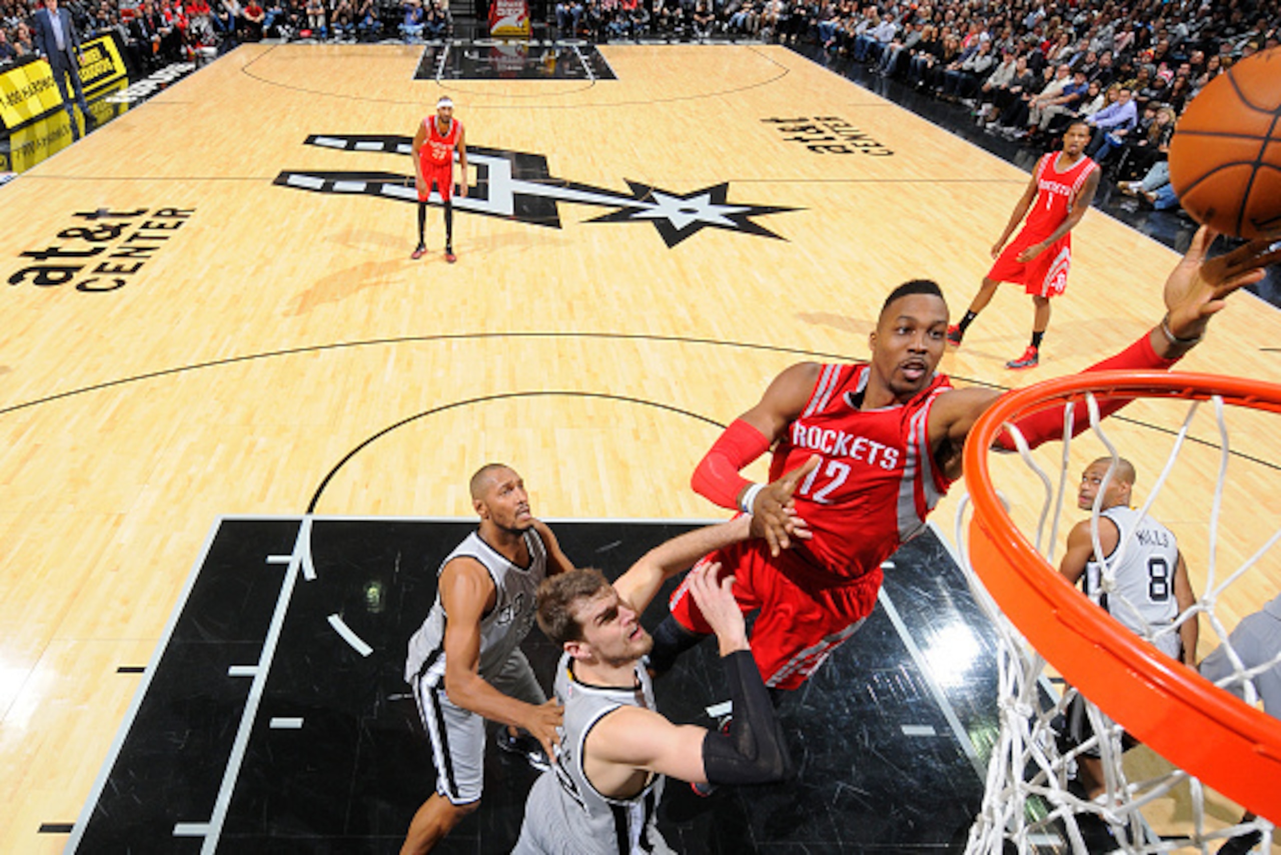 SAN ANTONIO, TX - DECEMBER 28:  Dwight Howard #12 of the Houston Rockets shoots the ball against the San Antonio Spurs during the game on December 28, 2014 at the AT&T Center in San Antonio, Texas. NOTE TO USER: User expressly acknowledges and agrees that