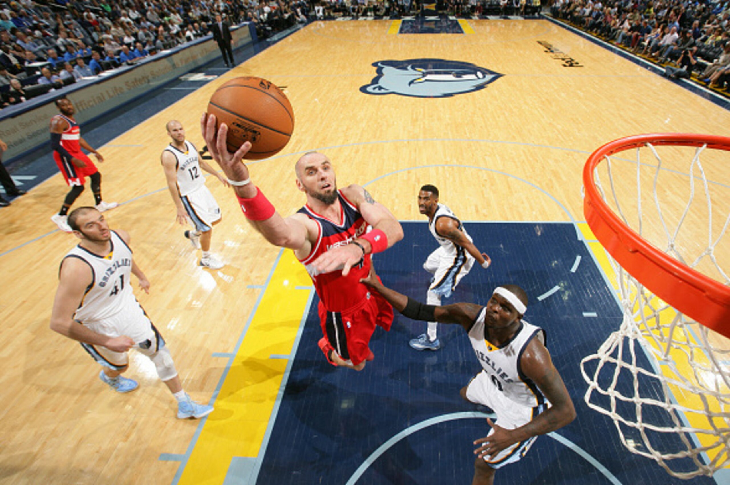 MEMPHIS, TN - APRIL 4: Marcin Gortat #4 of the Washington Wizards shoots against the Memphis Grizzlies on April 4, 2015 at FedExForum in Memphis, Tennessee. NOTE TO USER: User expressly acknowledges and agrees that, by downloading and or using this photog MEMPHIS, TN - APRIL 4: Marcin Gortat #4 of the Washington Wizards shoots against the Memphis Grizzlies on April 4, 2015 at FedExForum in Memphis, Tennessee. NOTE TO USER: User expressly acknowledges and agrees that, by downloading and or using this photog