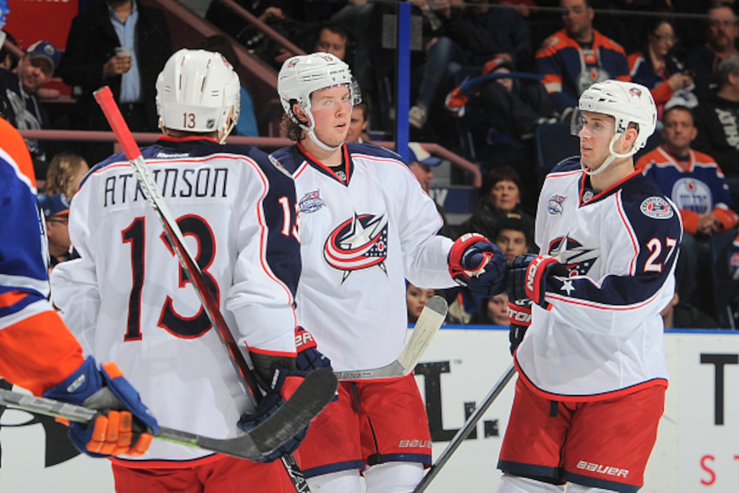 EDMONTON, AB - MARCH 18: Ryan Johansen #19, Ryan Murray #27, and Cam Atkinson #13 of the Columbus Blue Jackets celebrate after a goal during the game against the Edmonton Oilers on March 18, 2015 at Rexall Place in Edmonton, Alberta, Canada. (Photo by And