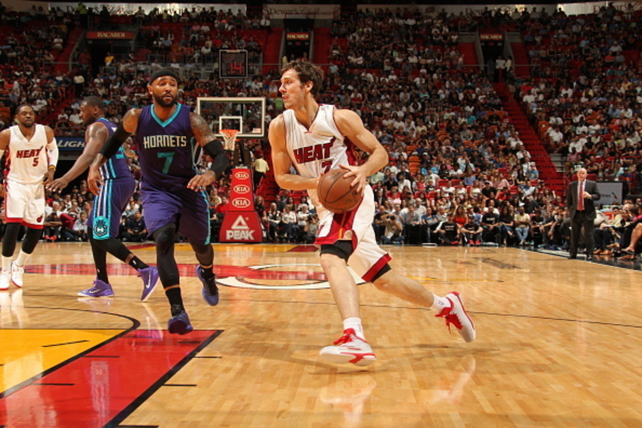 MIAMI, FL - APRIL 7:  Goran Dragic #7 of the Miami Heat drives to the basket against the Charlotte Hornets on April 7, 2015 at American Airlines Arena in Miami, Florida.  NOTE TO USER: User expressly acknowledges and agrees that, by downloading and or usi
