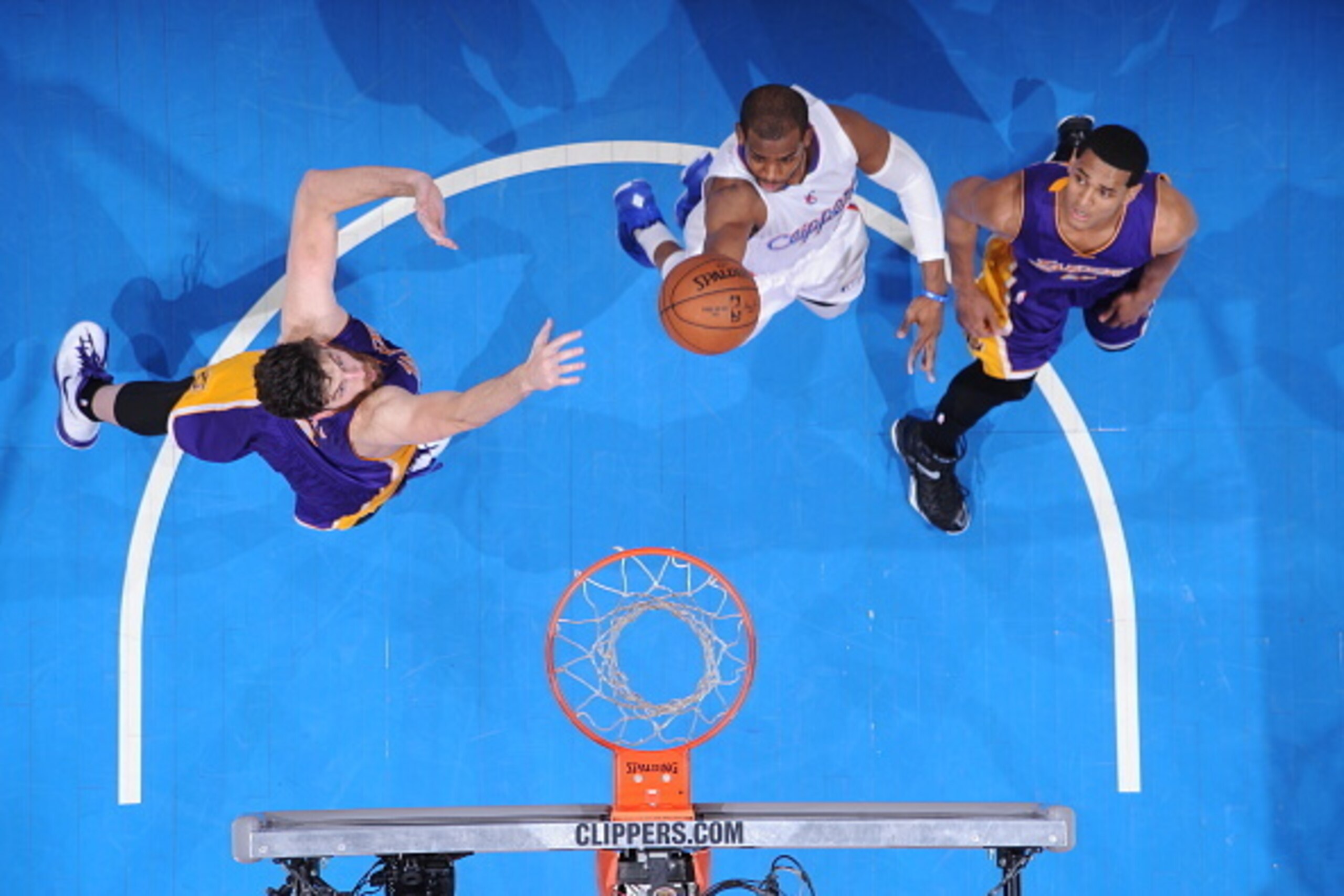 LOS ANGELES, CA - APRIL 7:  Chris Paul #3 of the Los Angeles Clippers goes to the basket against the Los Angeles Lakers on April 7, 2015 at Staples Center in Los Angeles, California. NOTE TO USER: User expressly acknowledges and agrees that, by downloadin